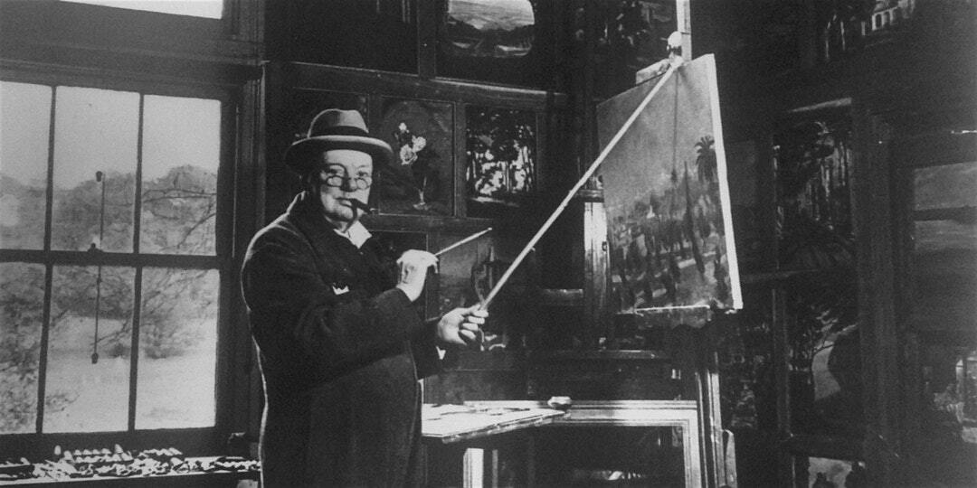 Winston Churchill posing in front of a painting