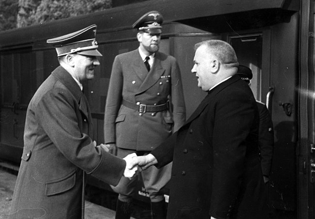 Slovak President Jozef Tiso greeting Adolf Hitler, October 1941.