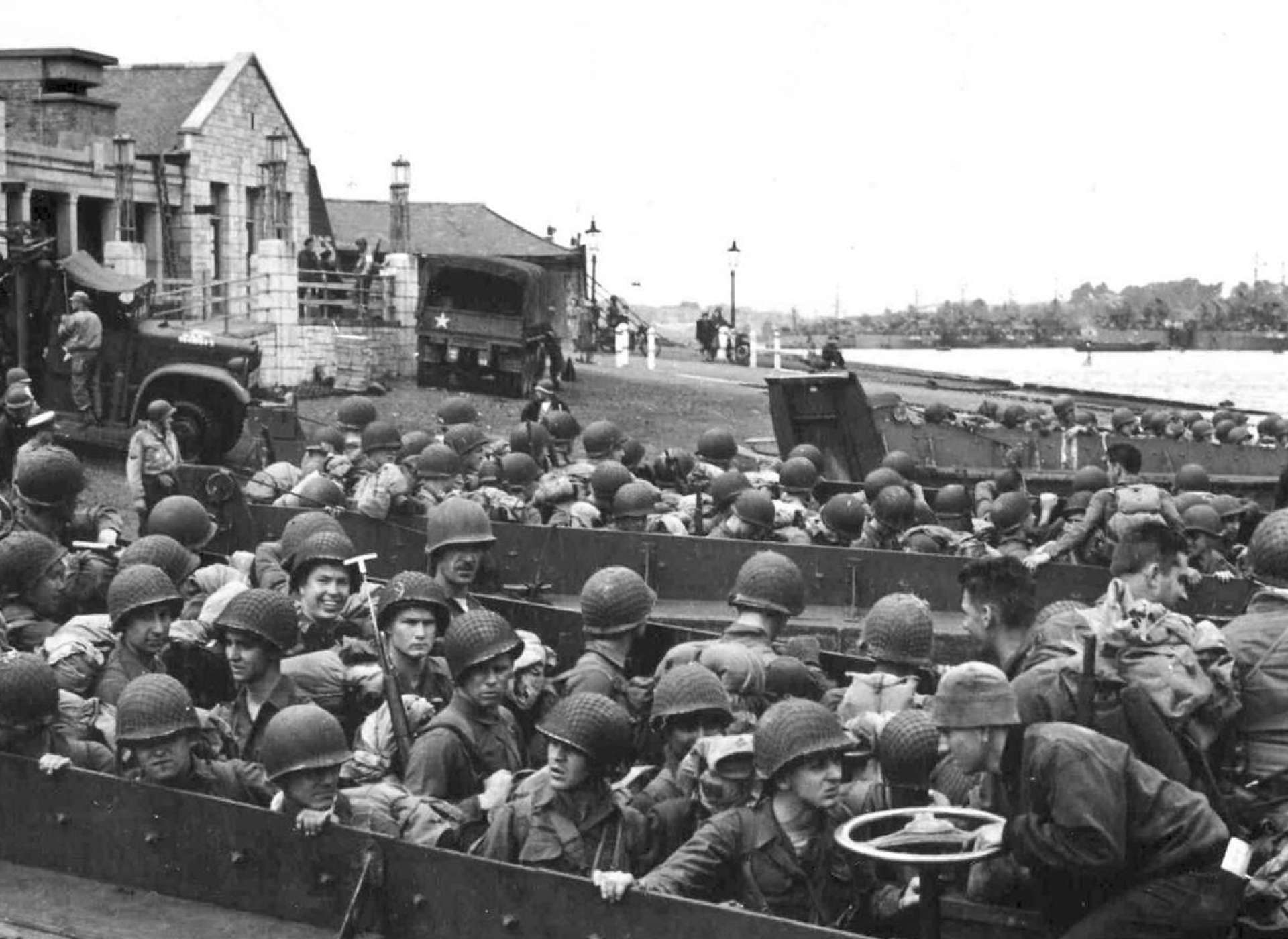 D-Day Invasion of Normandy gallery, photo of soldiers in boats on shores of Normandy