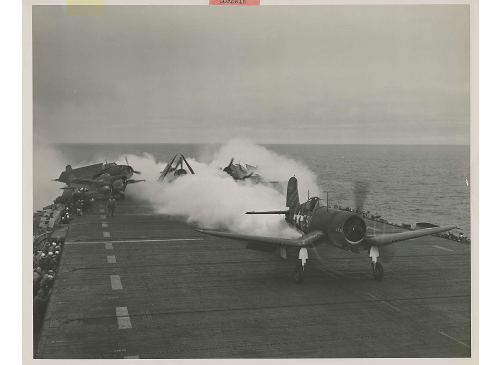 A Corsair testing rocket assisted takeoff from an aircraft carrier in September 1944. Gift In Memory of Charles Ives, 2011.102.450