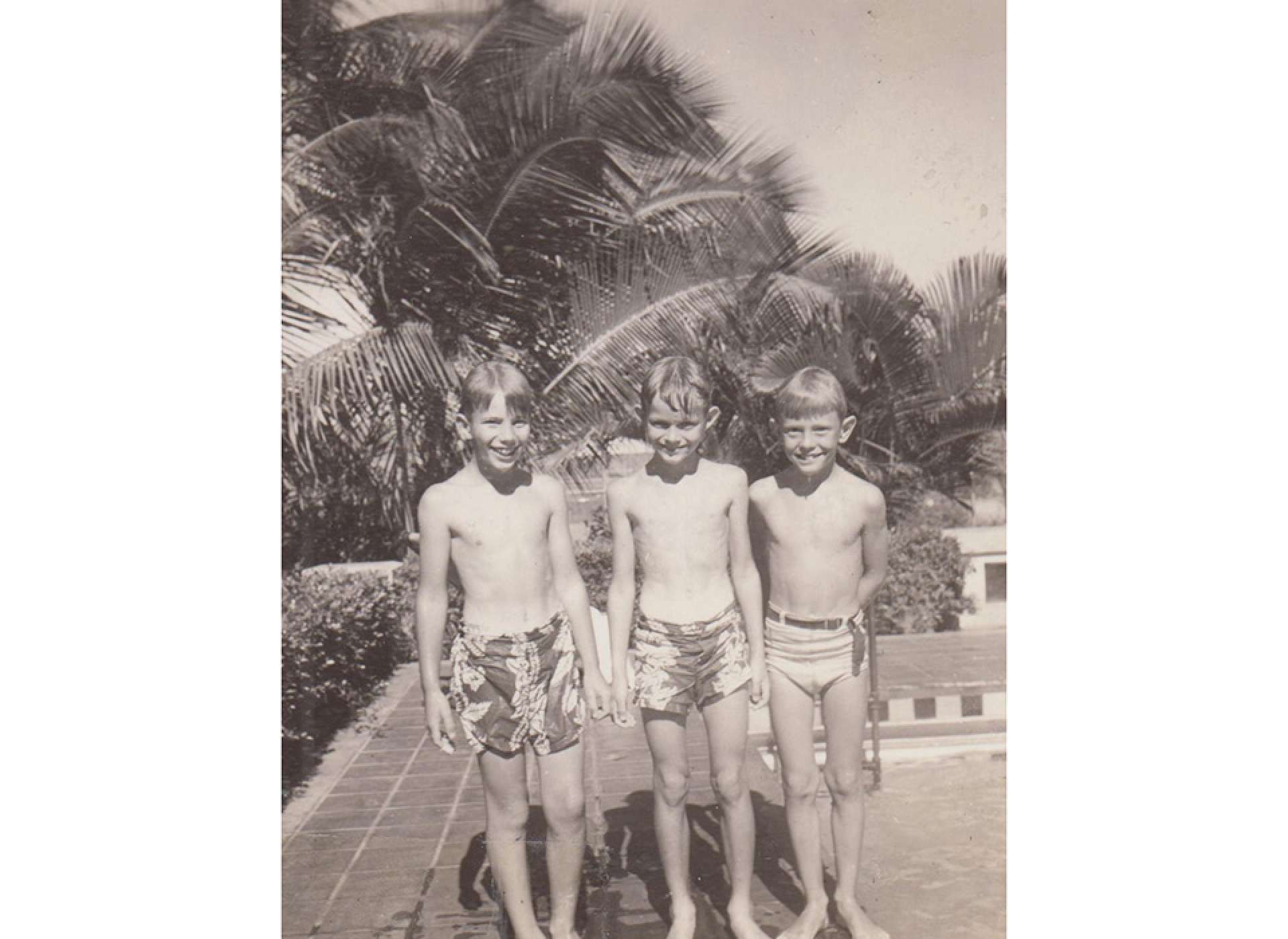 Thomas Gillette (center), Monty Higgins (on left) and a pal at the Pearl Harbor submarine base swimming pool in the summer of 1940. Image courtesy of Thomas Gillette.