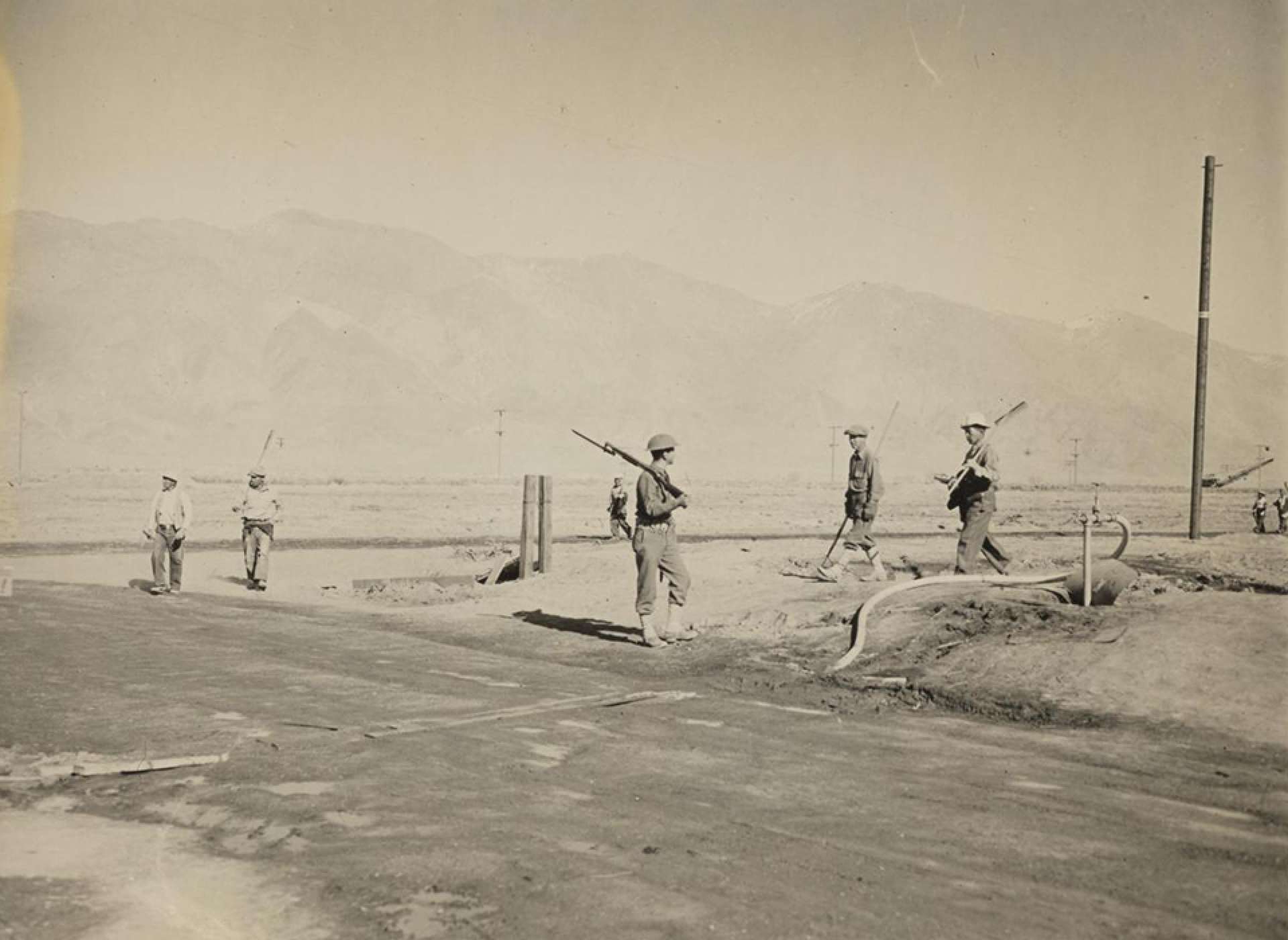 Army Police Guarding Japanese Americans Manzanar 1942