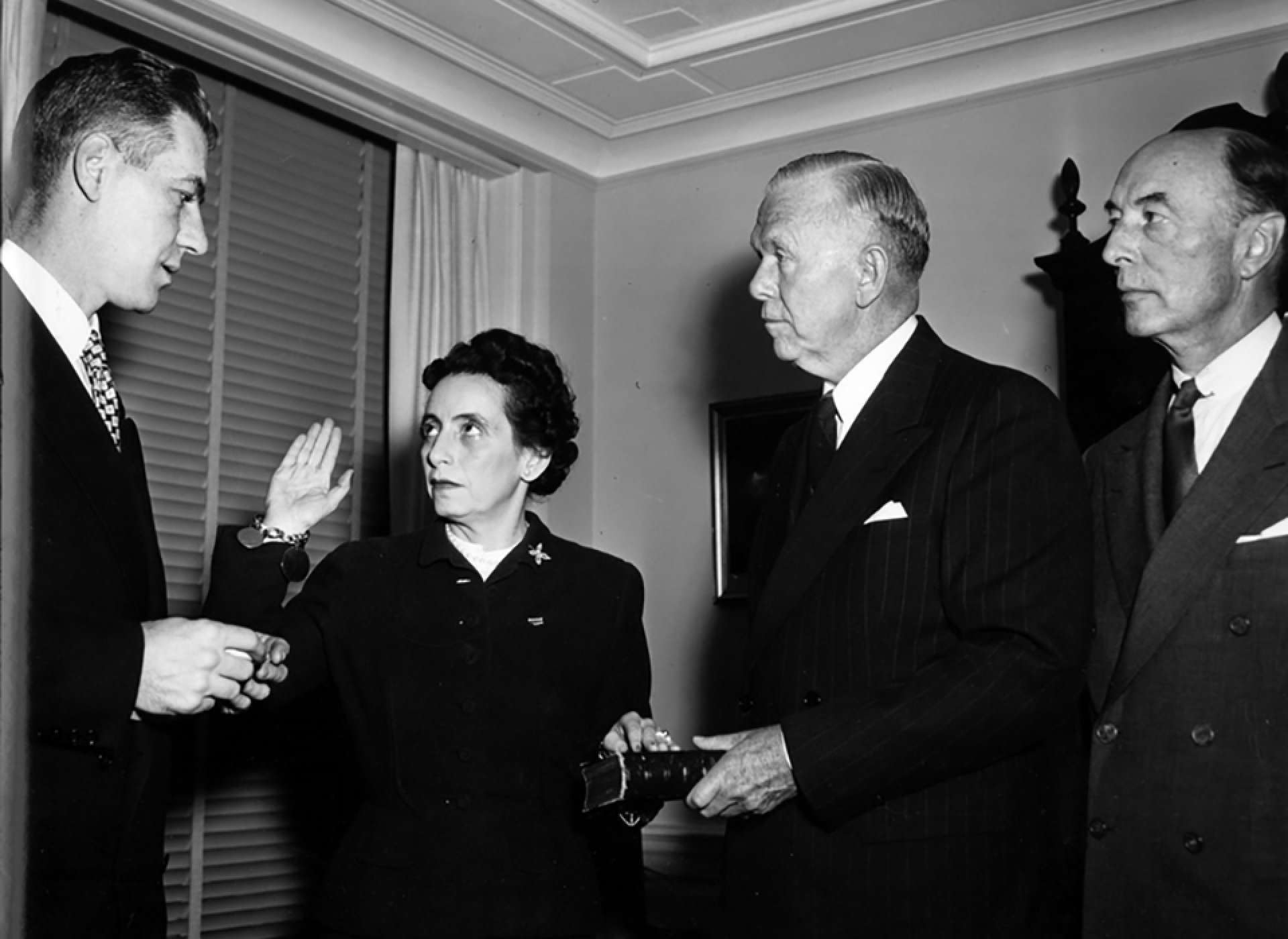 Anna M. Rosenberg being sworn in as Assistant Secretary of Defense