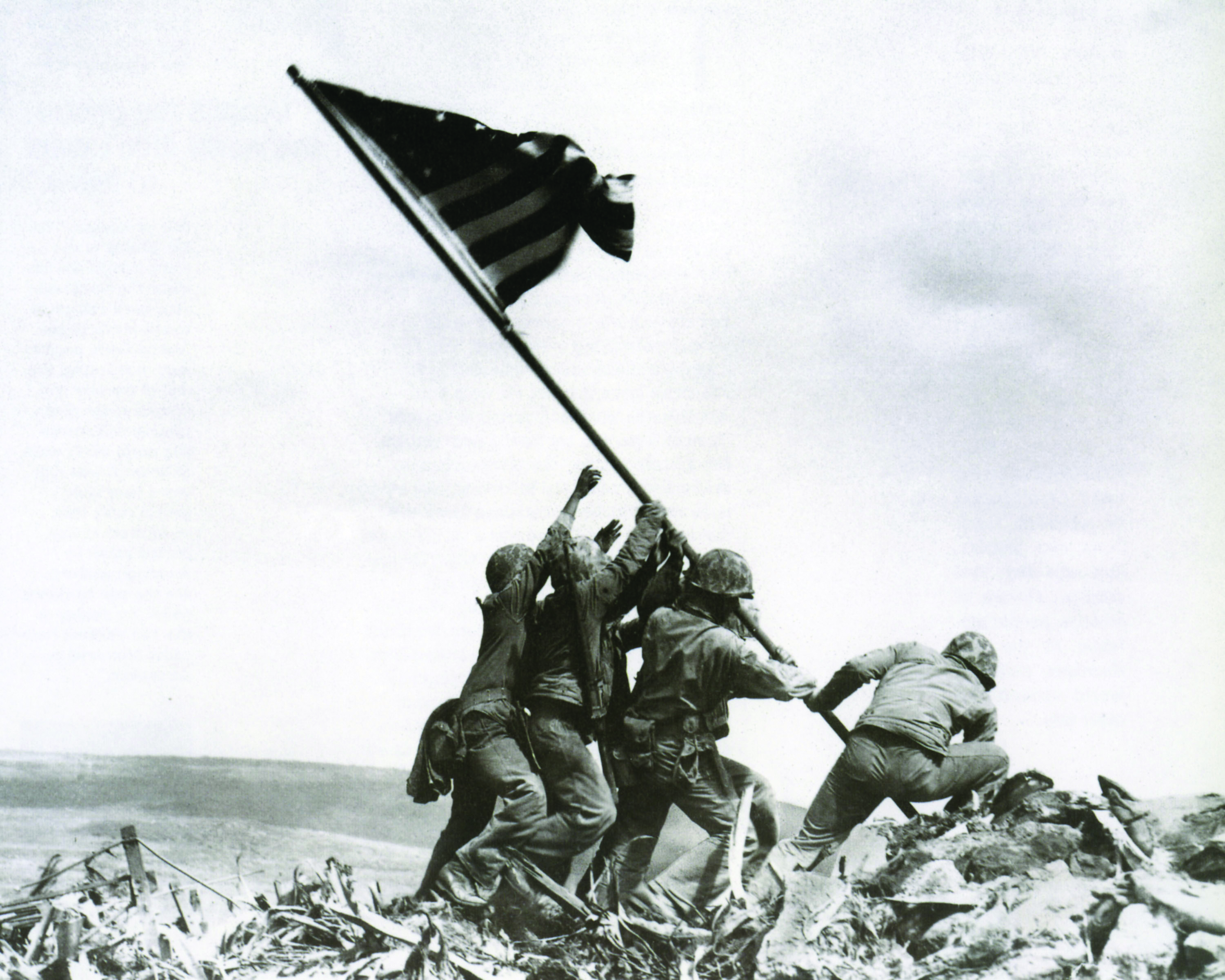 Iconic Iwo Jima flag raising with soldiers raising the American flag