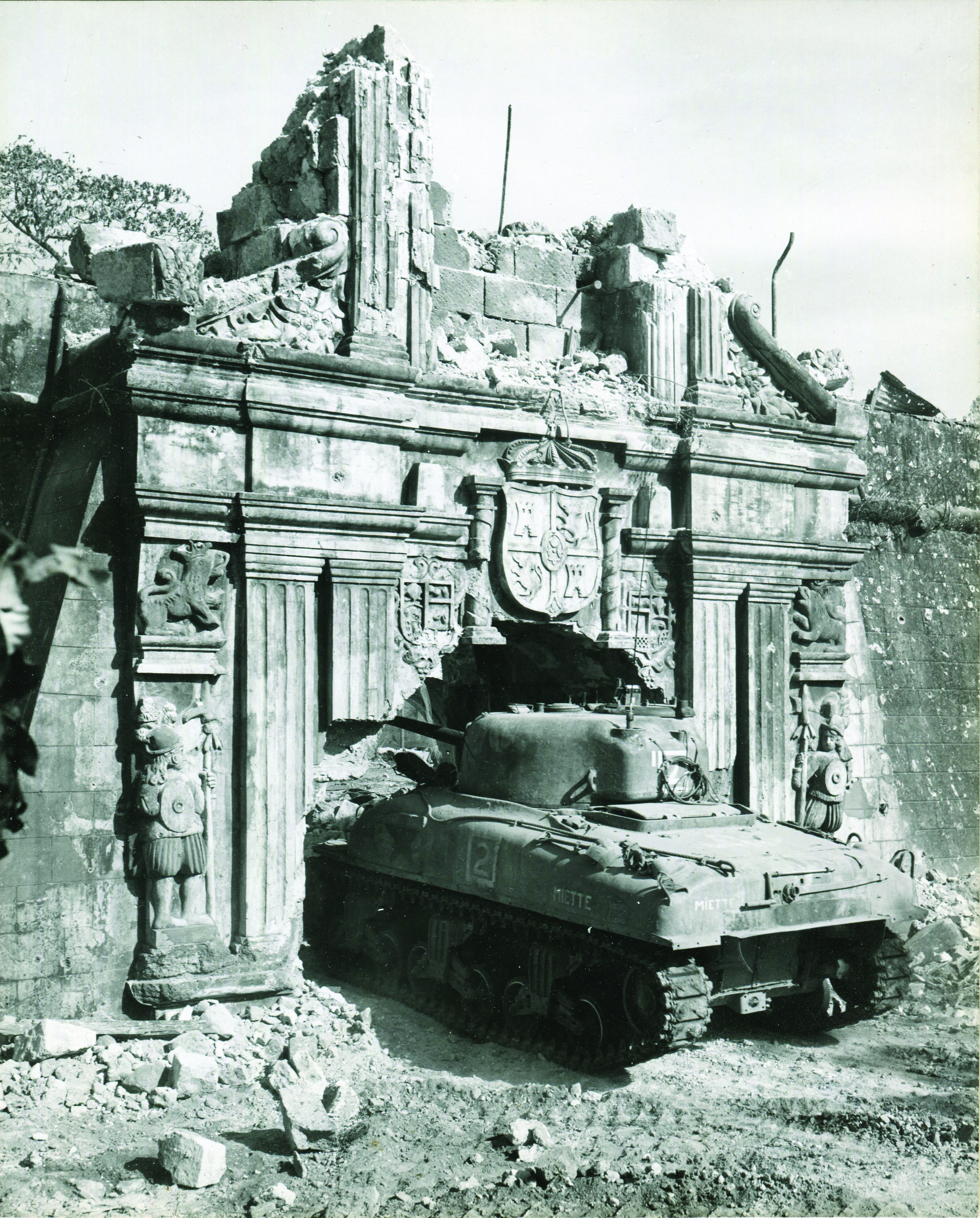 Fort Santiago: US tank going through a hole in the walls of Fort Santiago