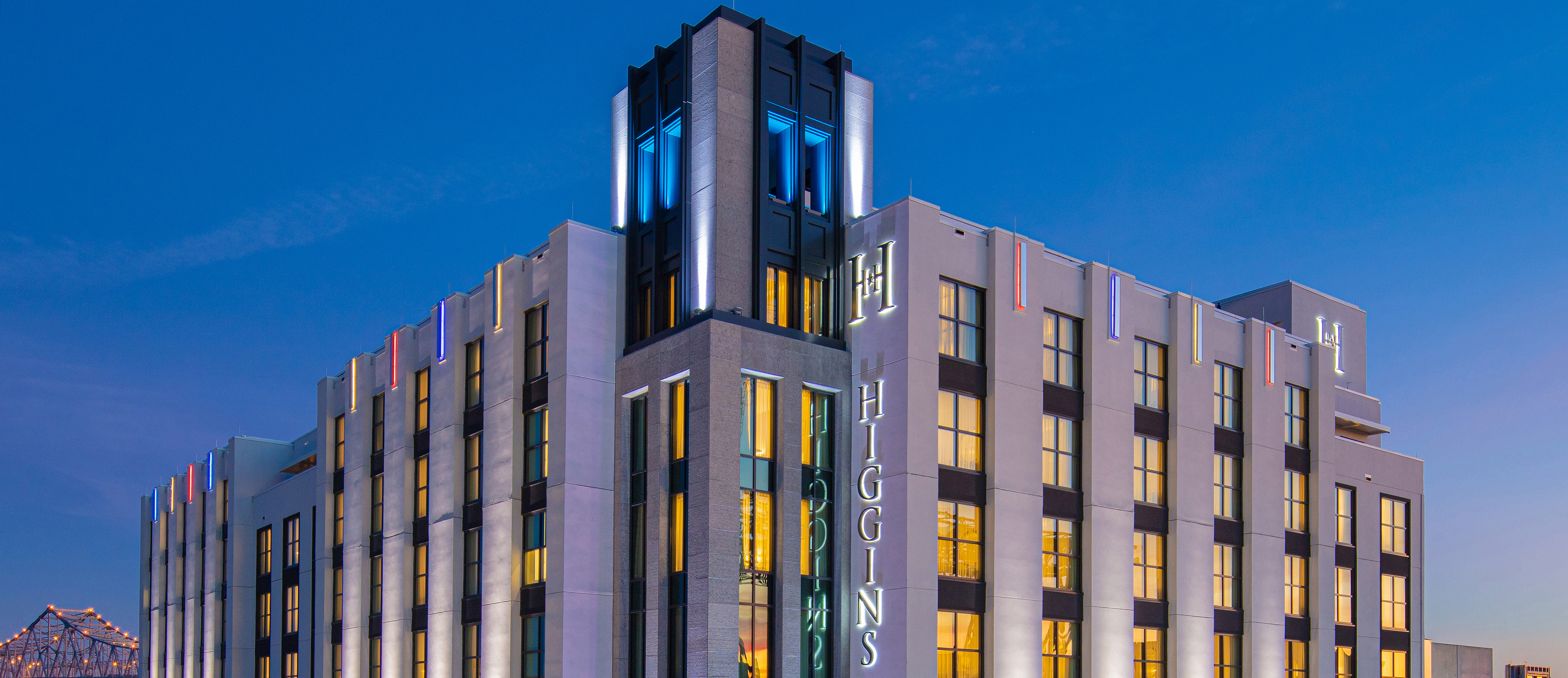 Beautiful exterior photo of the National WWII Museum's Higgins Hotel at night