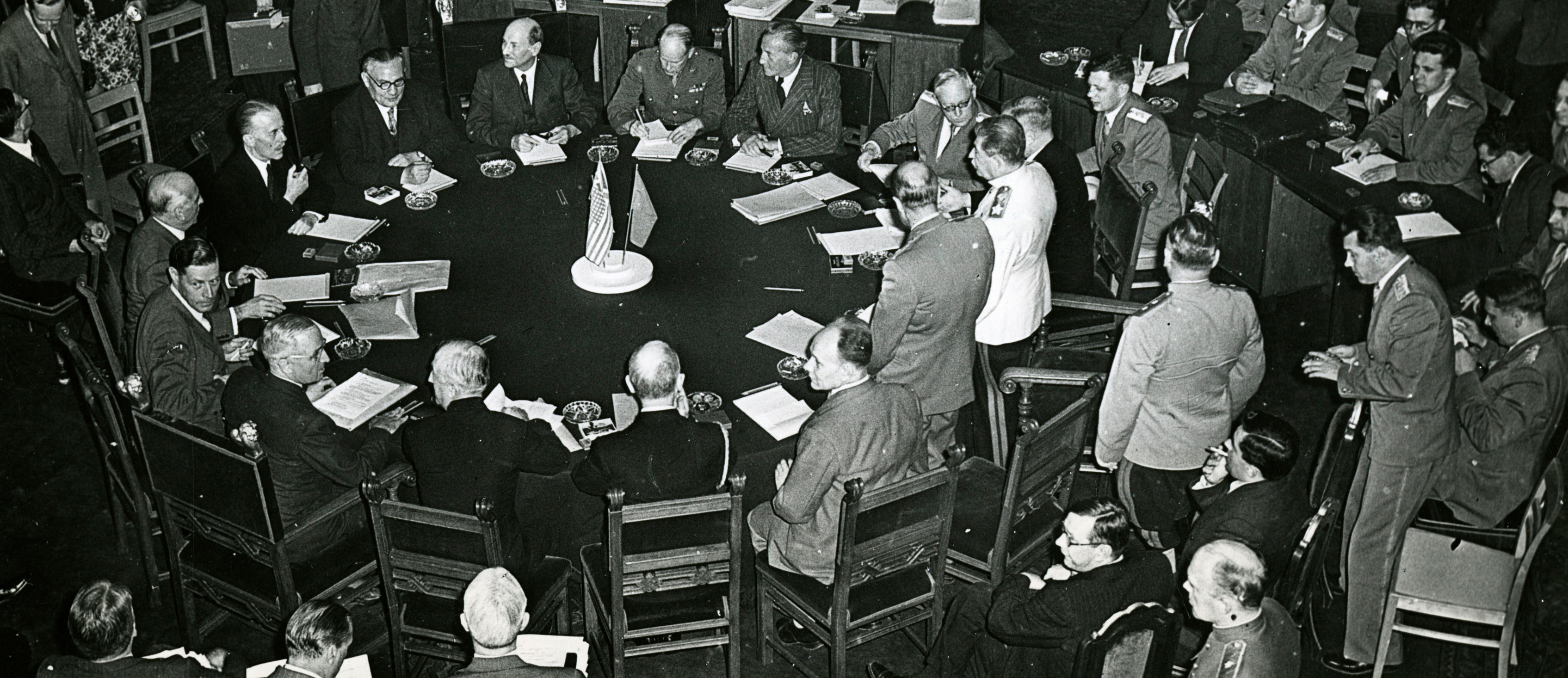 Allied leaders meet around a large circular table