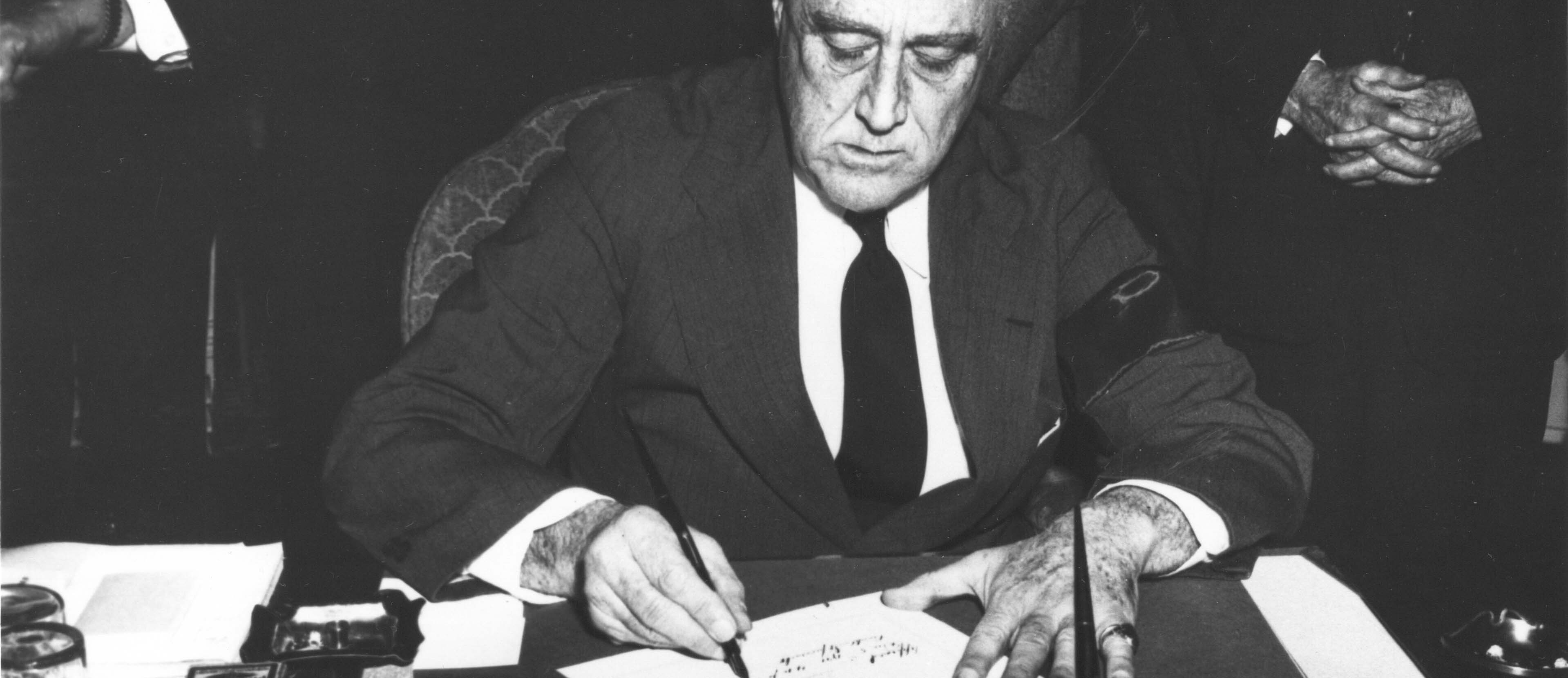 FDR signs documents