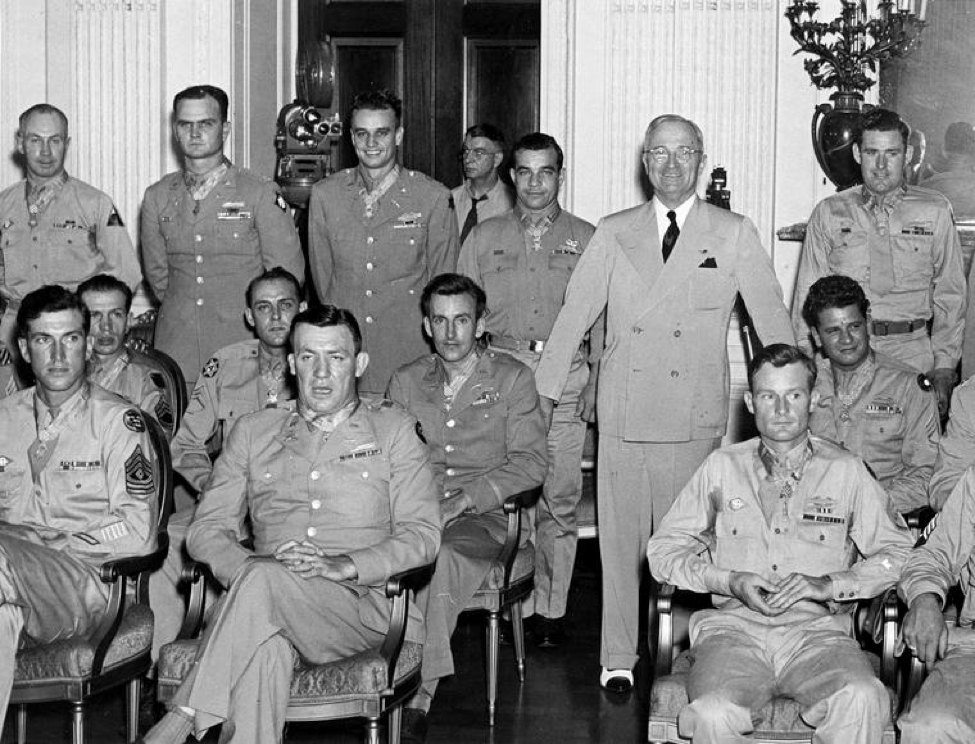 President Harry S. Truman with some of the 28 recipients of the Medal of Honor who were decorated at a ceremony in the East Room of the White House, August 23, 1945. Photo by Abbie Rowe.  Courtesy of President Harry S. Truman Library and Museum, accession number 65-3809