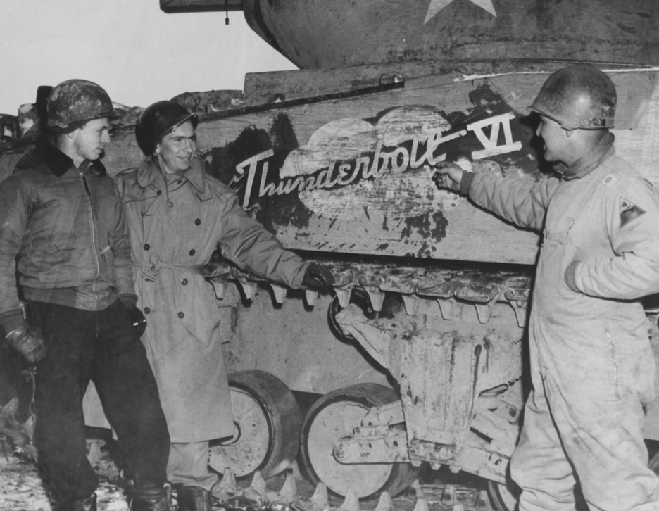 To show his appreciation of the lighting speed of armor, Lt. Col. Creighton Abrams, right, commander of Combat Command B, 4th Armored Division, named his tank &quot;Thunderbolt.&quot; Courtesy National Archives and Record Administration