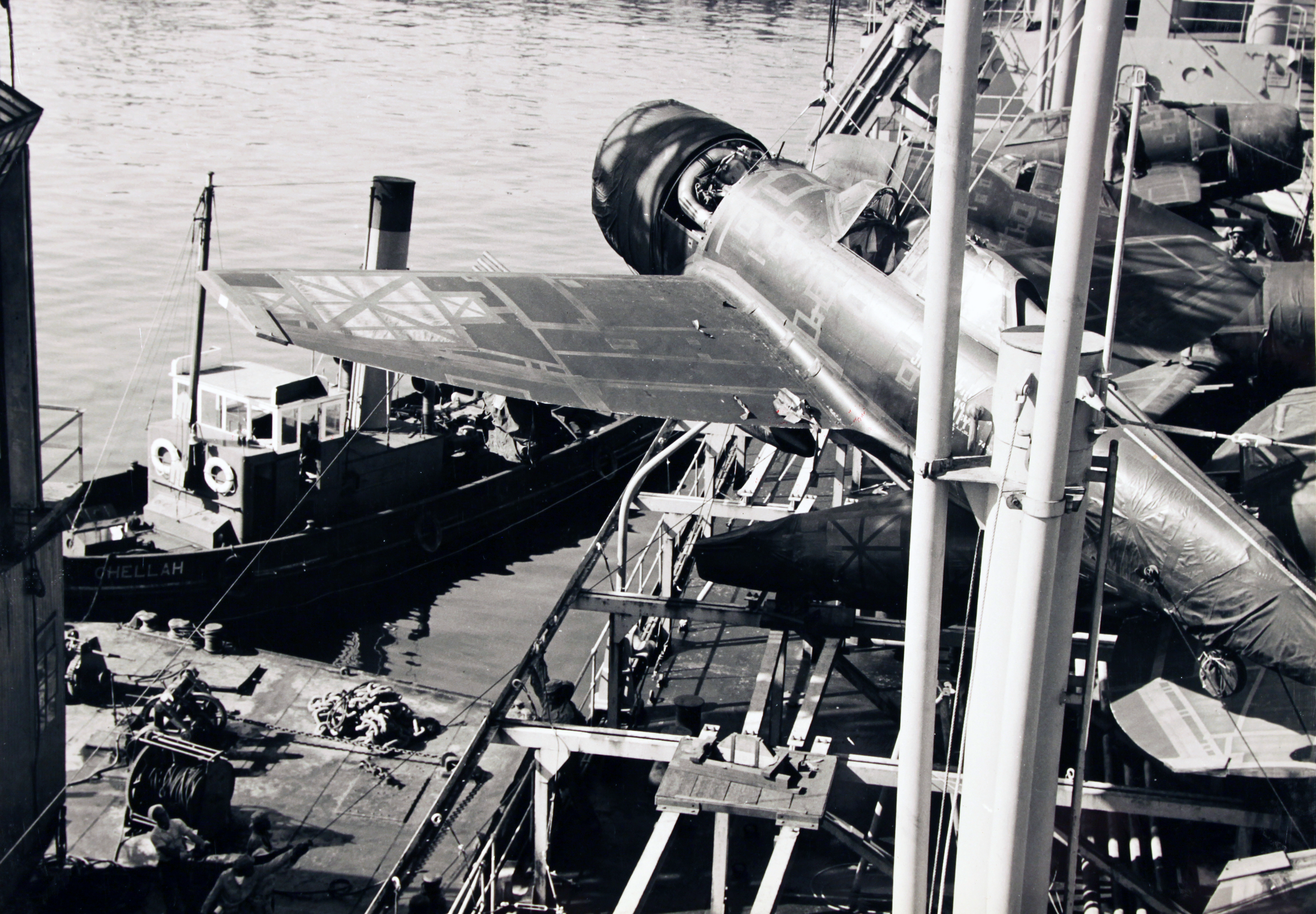 A new P-47, swaddled in protective tape and coverings, arrives in England