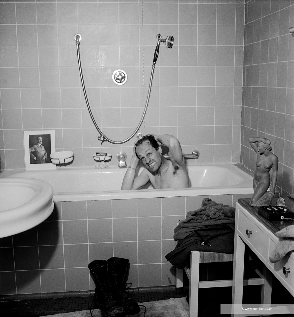 David E. Scherman taking a bath at Hitler’s apartment in Munich.
