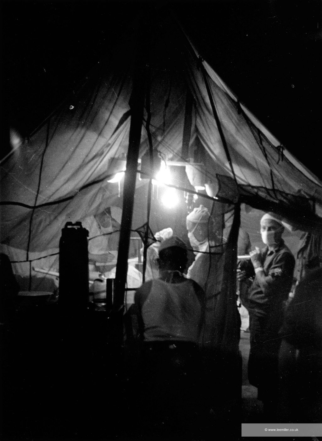 Tent operating theater at the 44th Evacuation Hospital, Normandy, France, July 1944. 