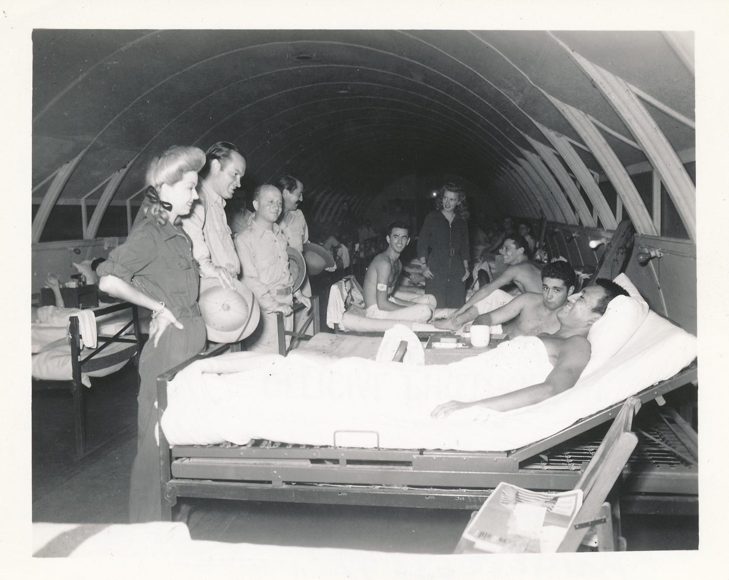 Hope and his troupe during a hospital visit in the Solomon Islands, 1944. Courtesy of the Bob &amp; Dolores Hope Foundation.