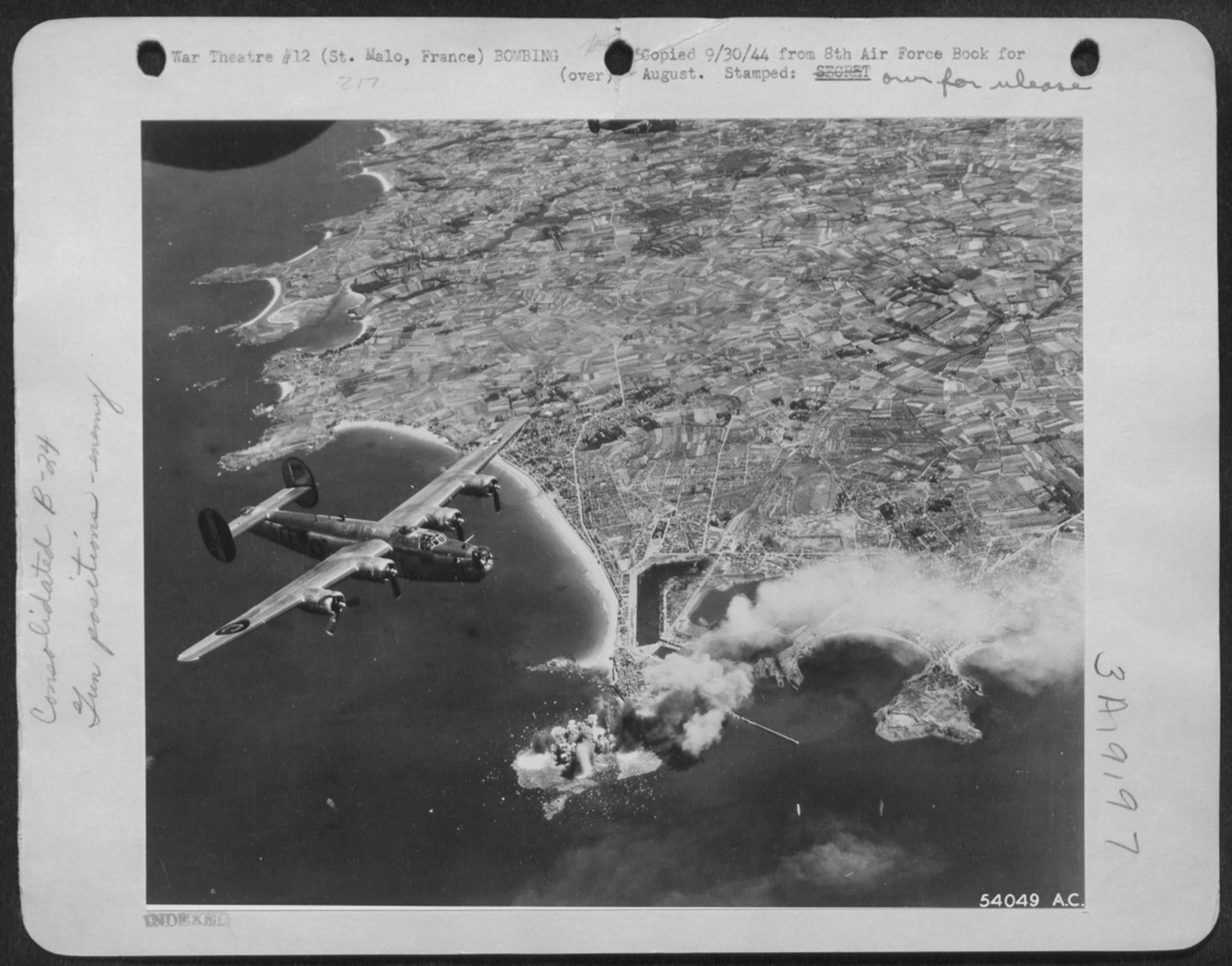 Consolidated B-24 bombers attack Saint-Malo in August 1944