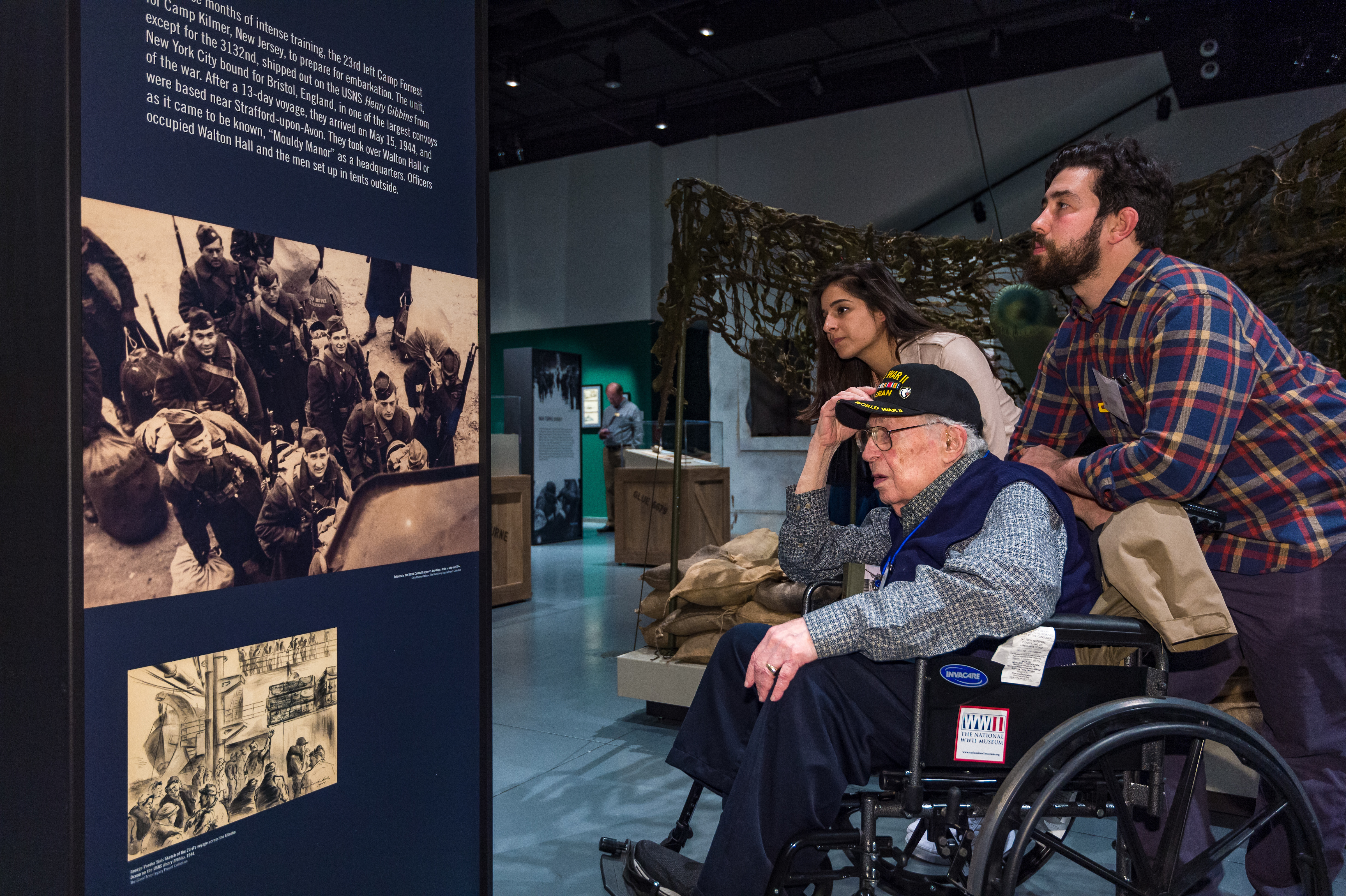 Seymour Nussenbaum tours the Ghost Army exhibit during the opening event.