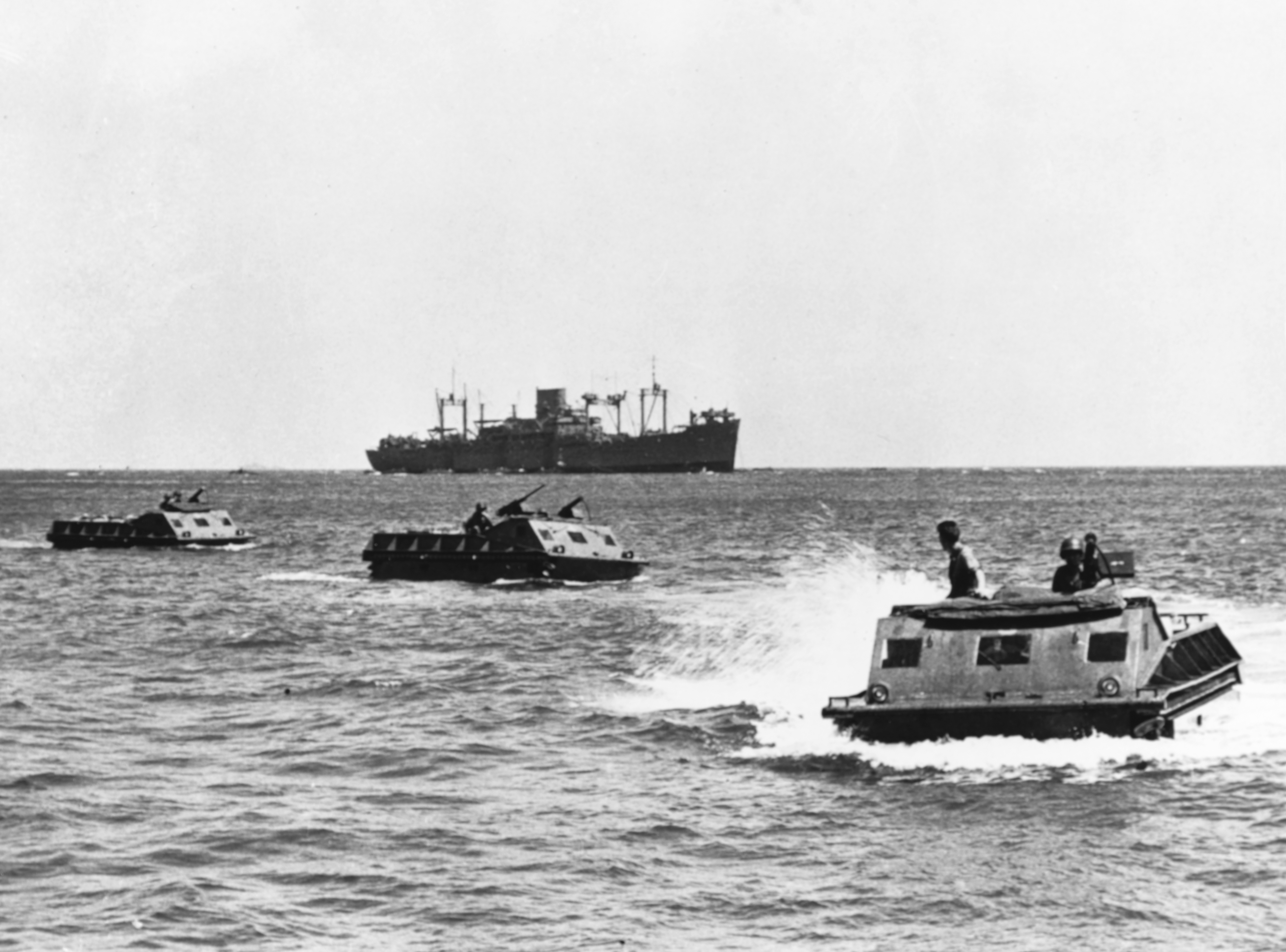 LVT(1) amphibian tractors move toward the beach on Guadalcanal Island