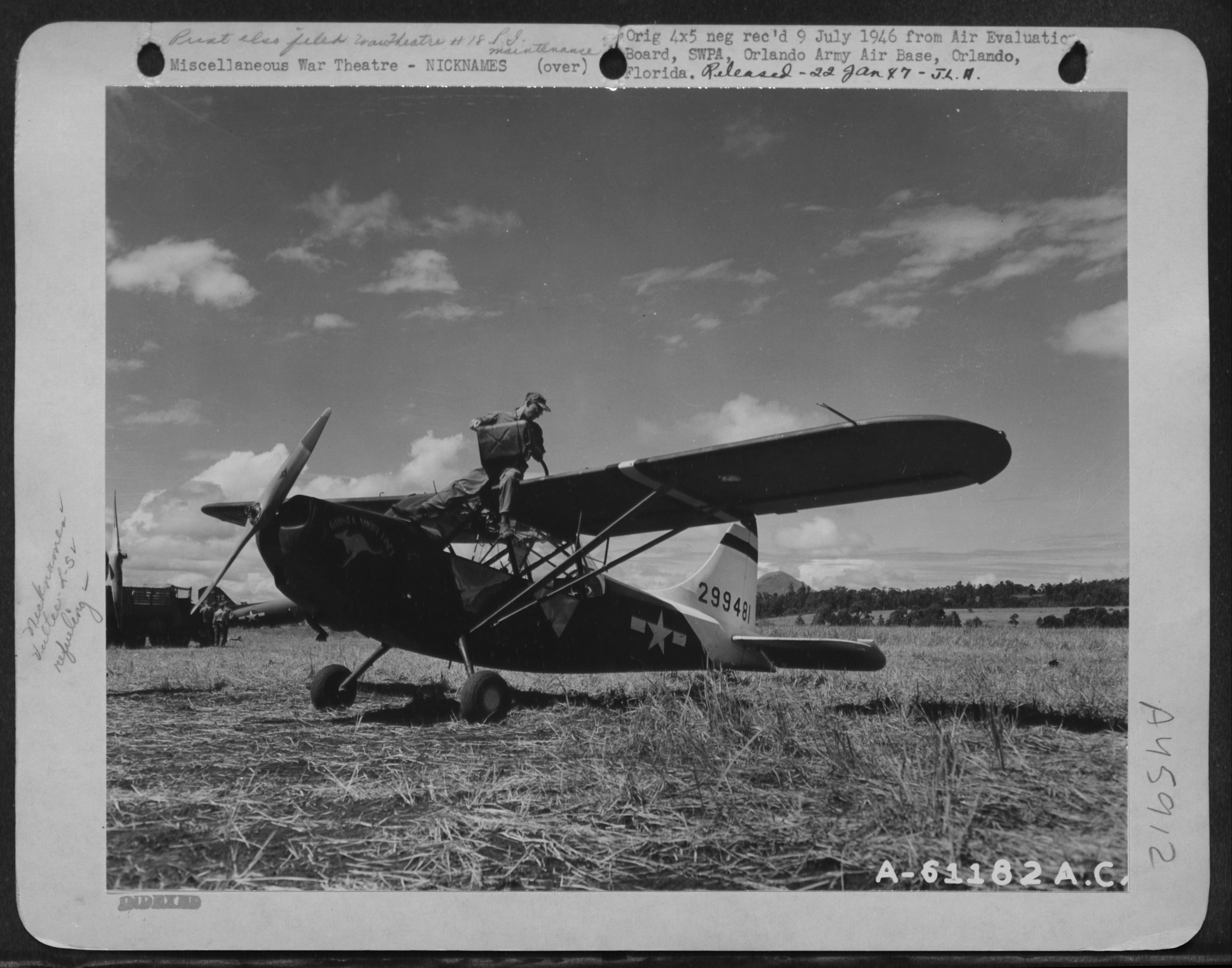Vultee L-5 &quot;Guinea Short Lines&quot; being refueled at Valencia Airstrip, Mindanao