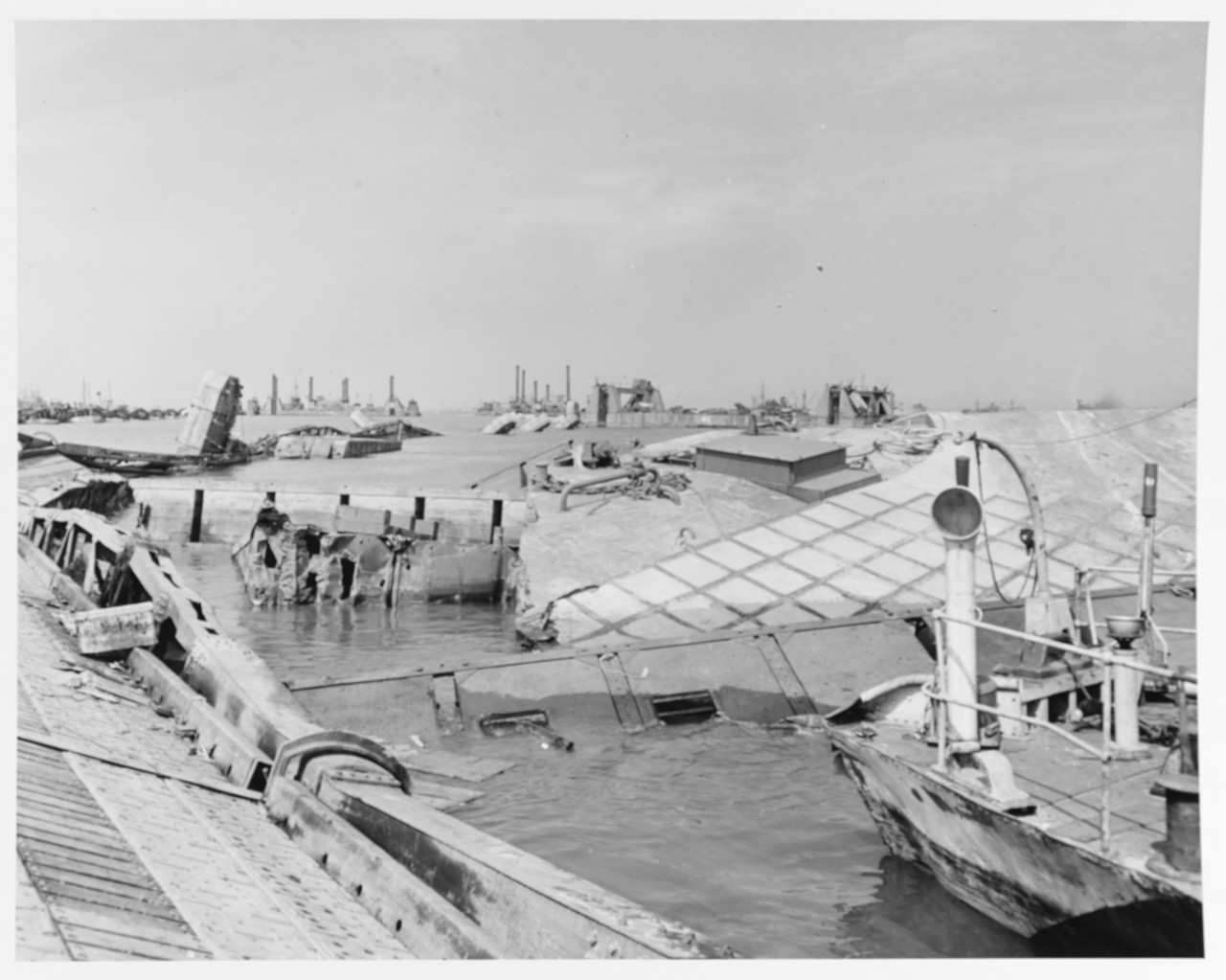Wrecked pontoon causeway of one of the Mulberry artificial harbors