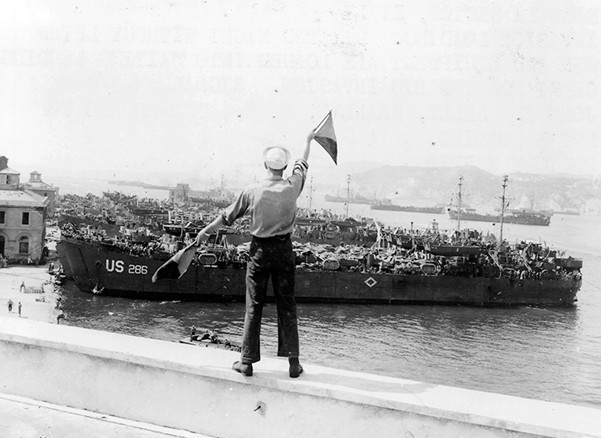 USS LST-286 with other LSTs invasion loading in the Bagnoli sector, Italy