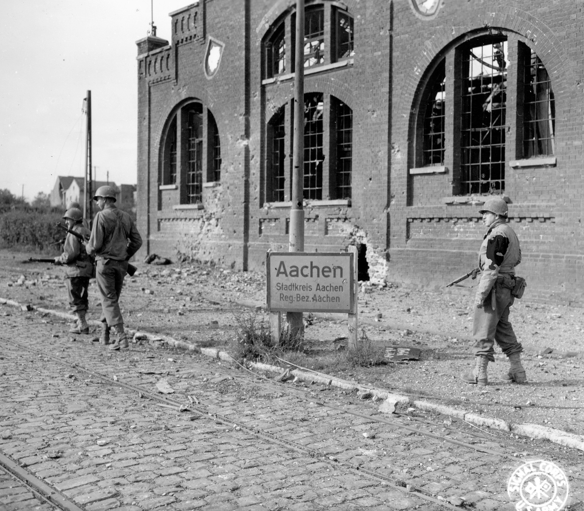 Soldiers from the 1st Infantry Division enter Aachen Germany