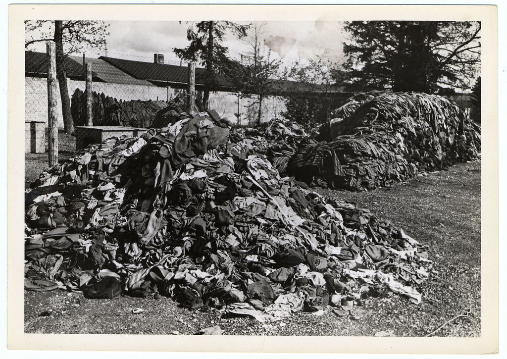 Tattered clothes from prisoners who were forced to strip before they were killed lay in huge piles near the crematorium of Dachau