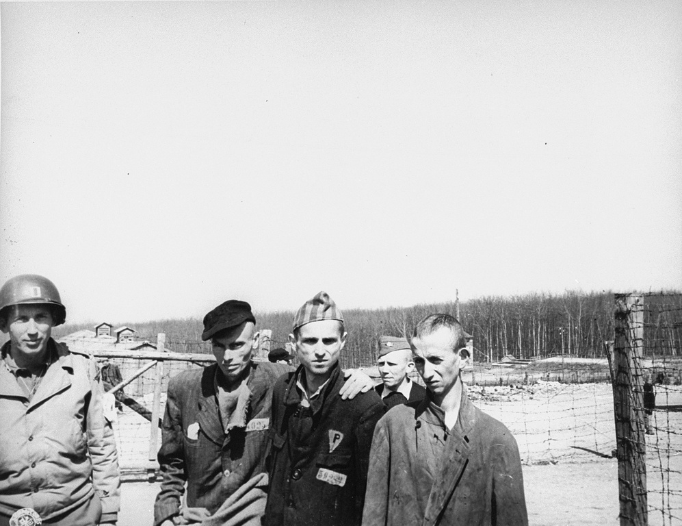 An American captain with survivors in Buchenwald