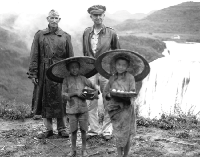 Lieutenant General William Hood Simpson and General Albert C. Wedemeyer with two children, August 1945.