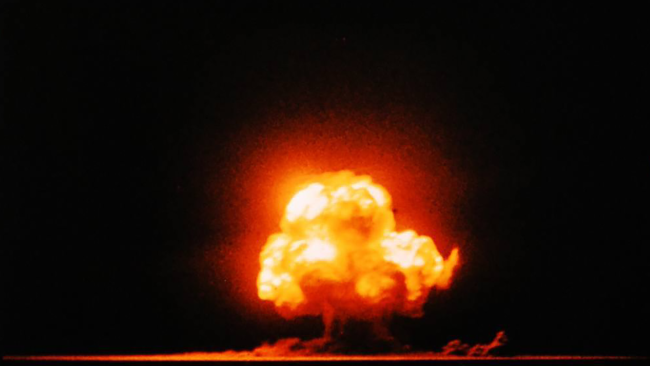 Famous color photograph of the "Trinity" shot, the first nuclear test explosion.