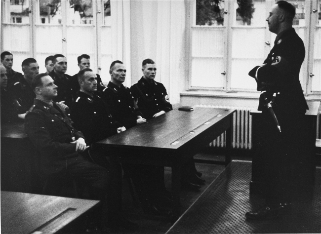 Heinrich Himmler lectures to a group of SS officers 