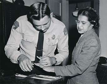 Montgomery Police Lieutenant D.H. Lacky fingerprinting Rosa Parks