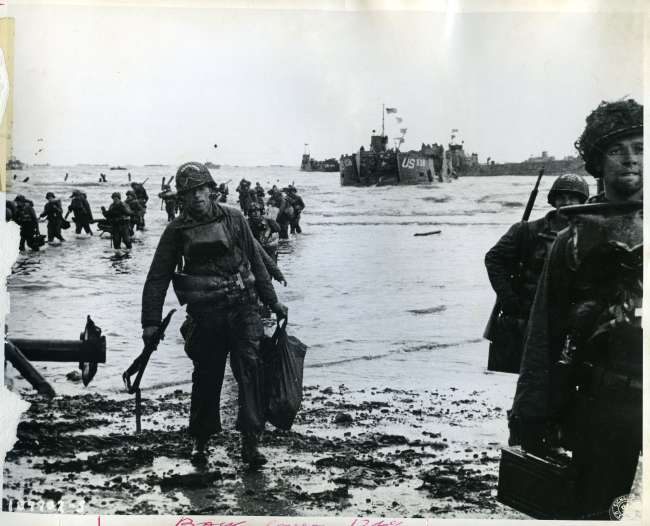 American assault troops move onto Omaha Beach