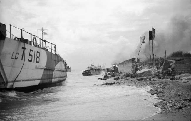 Wrecked landing craft on Nan Red beach, Juno area