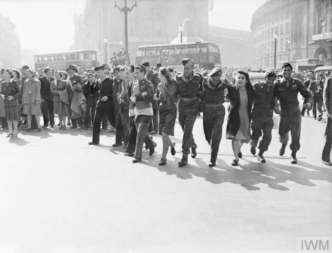 BRITAIN HEARS NEWS OF END OF WWII