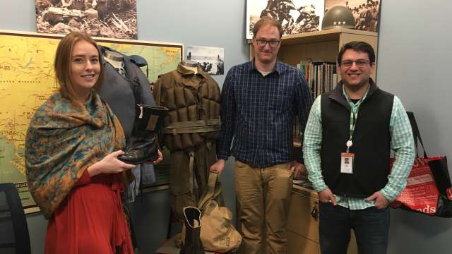 Museum curators with Pearl Harbor artifacts 