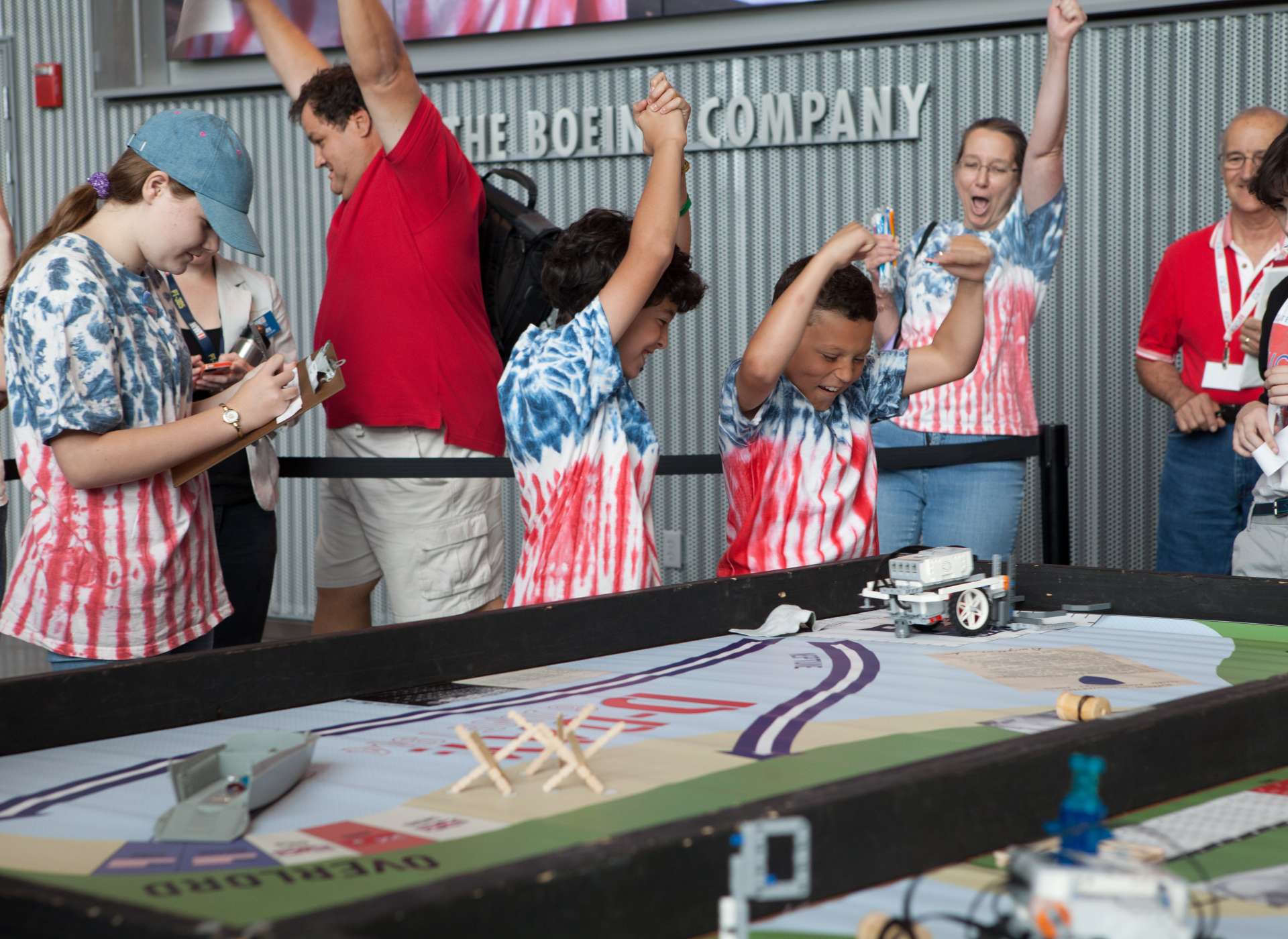 Kids celebrating a win at the Robotics Challenge