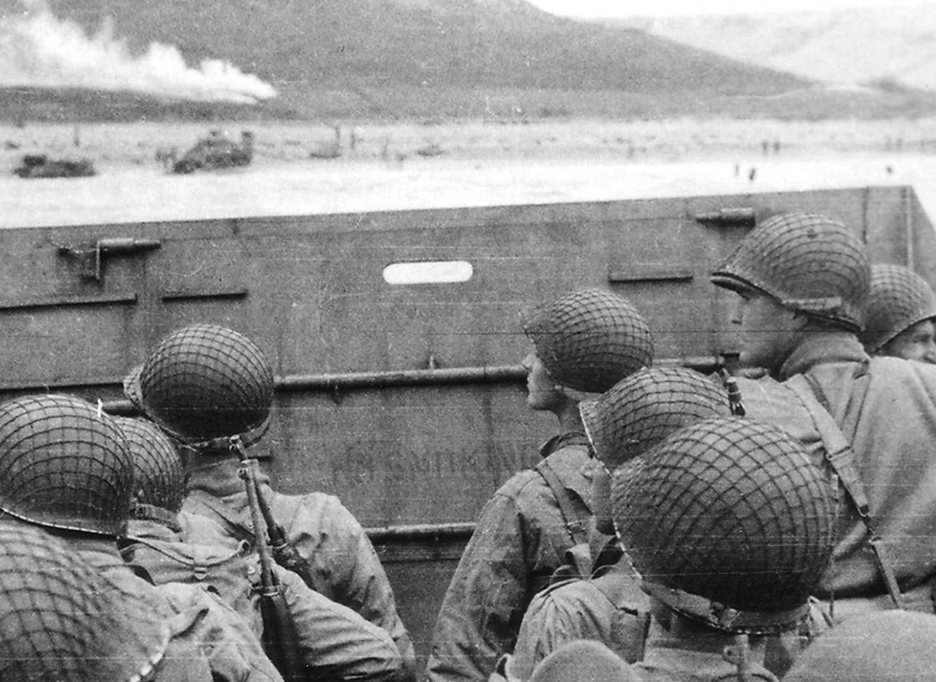 D-Day Invasion of Normandy gallery, photo of soldiers storming the beaches of Normandy