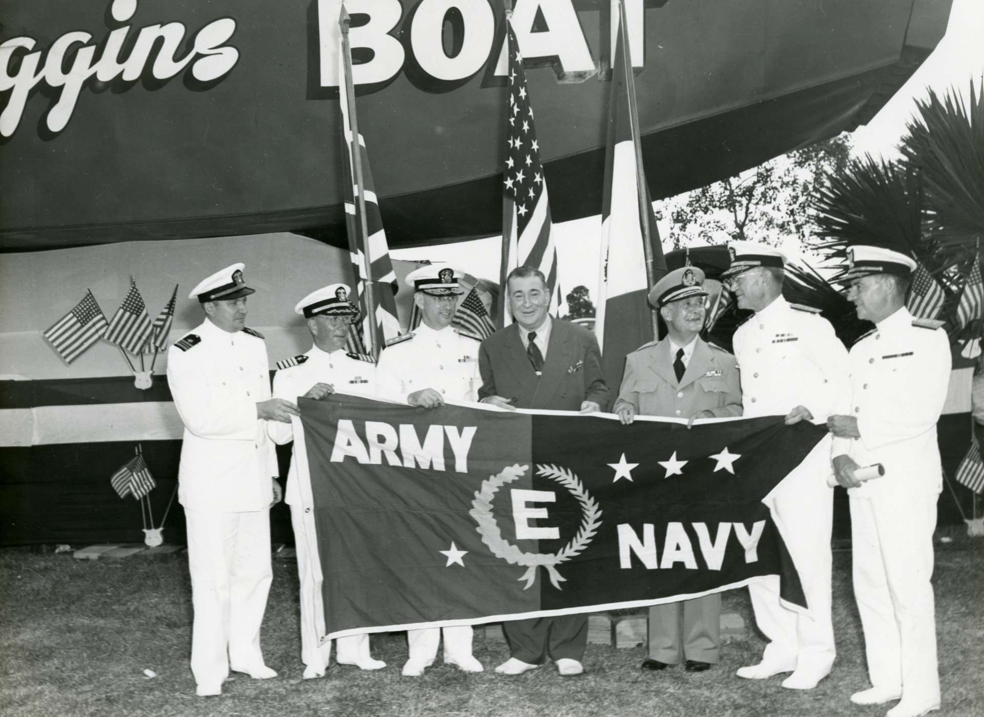 Andrew Higgins receives the Army-Navy &quot;E&quot; Flag Award.