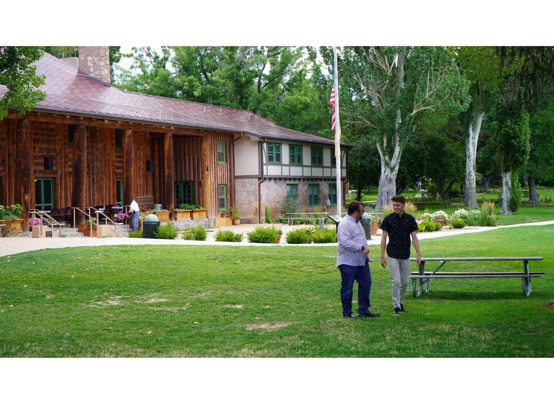 Elliot Schultz, Historian of Science from the Bradbury Science Museum, with student reporter Isaac in front of Fuller Lodge