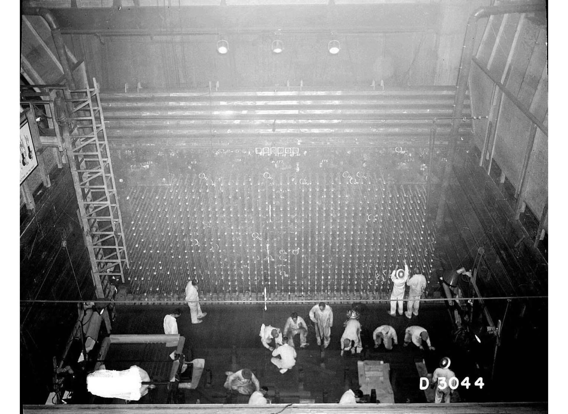Men working near the face of B Reactor in 1944. Courtesy of The National Archives.