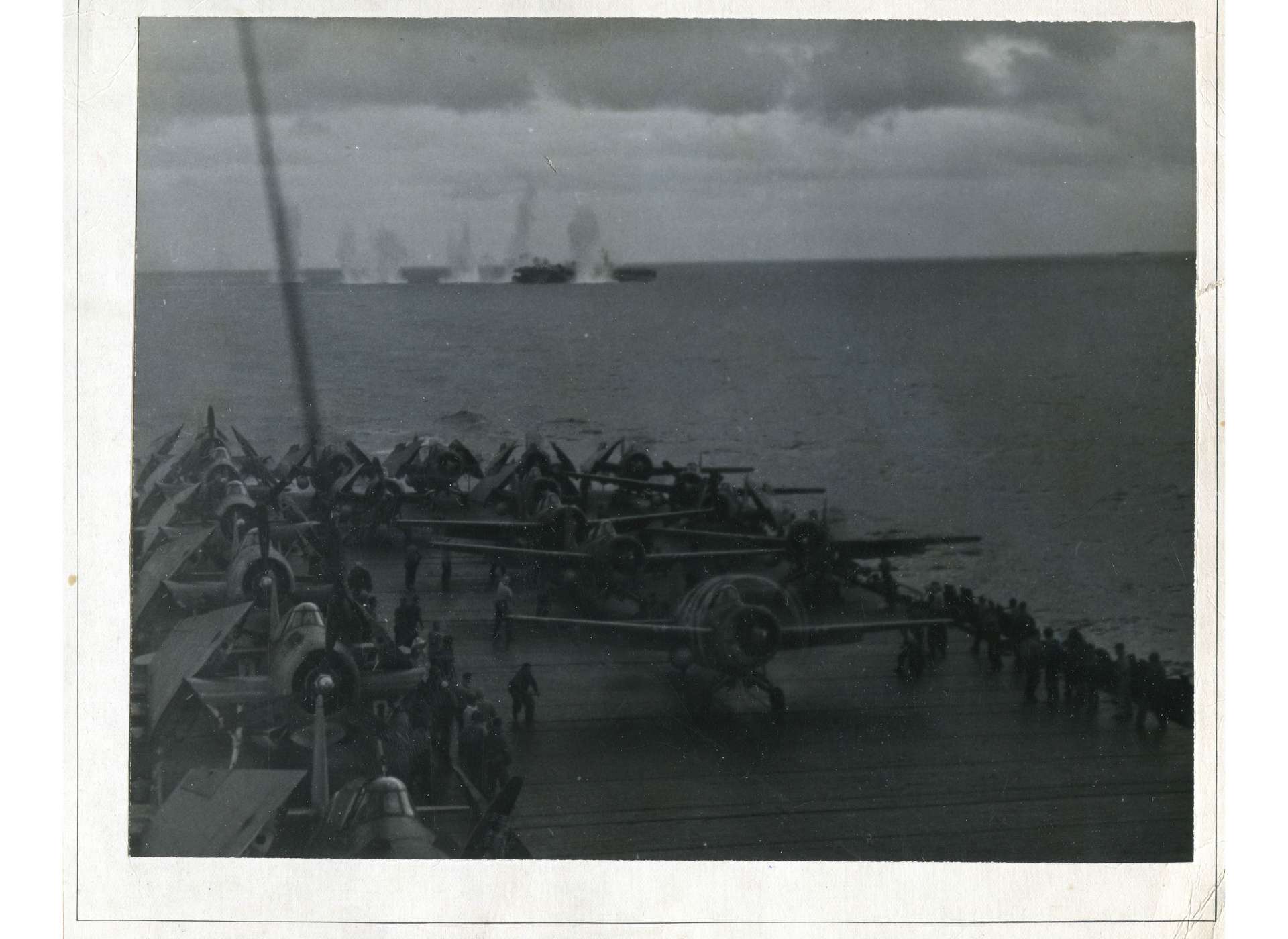 Japanese salvos dropping near USS White Plains (CVE-66) as seen from USS Kitkun Bay (CVE-71) during Battle off Samar.