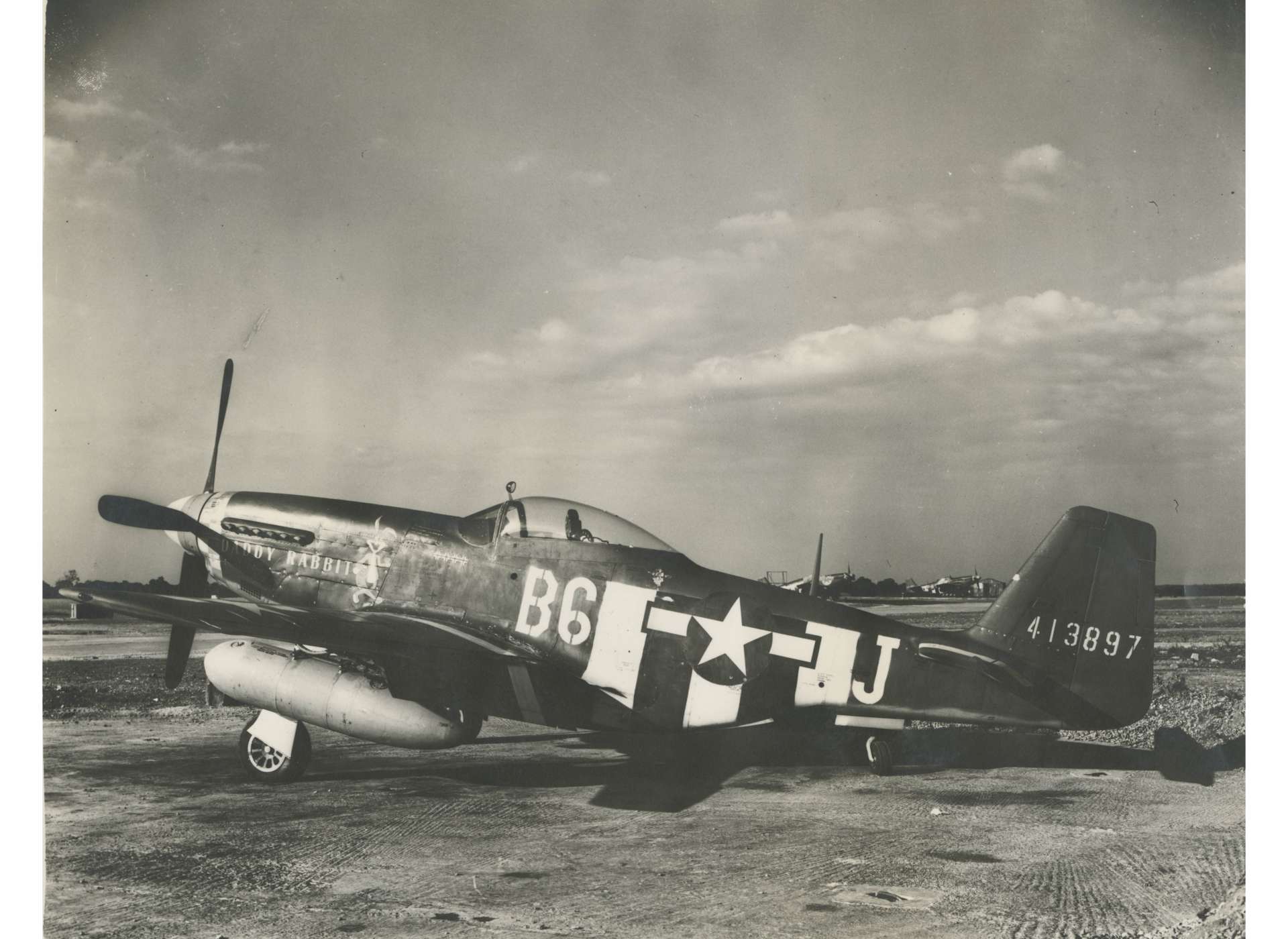 Captain Charles K. Peters&#039;s P-51D, the Daddy Rabbit, and Lieutenant Charles Yeager&#039;s future aircraft, the Glamorous Glenn II.
