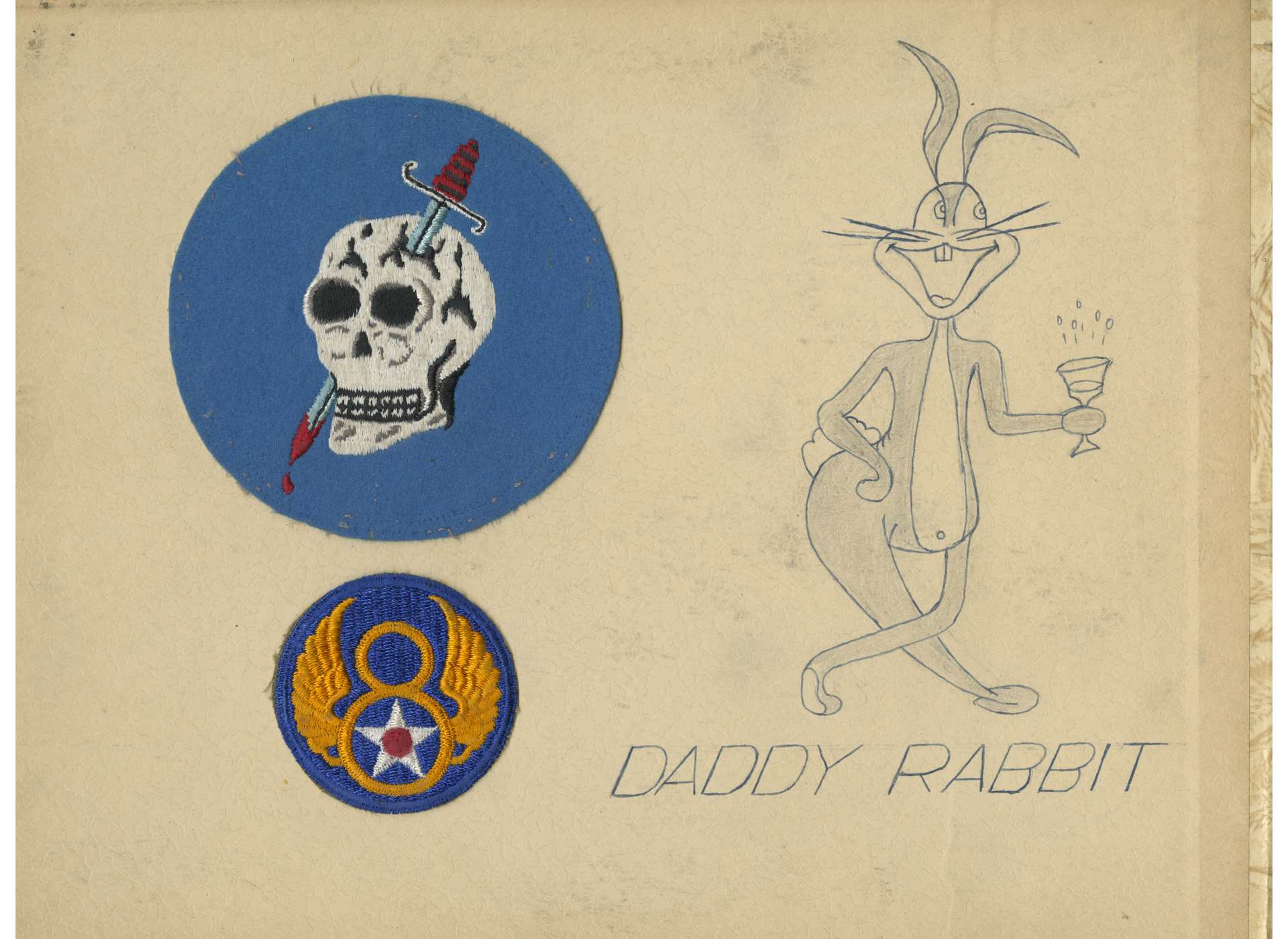 A page from Captain Charles K. Peters&#039;s scrapbook. Peters&#039;s 363rd Fighter Squadron and 8th Air Force patch are pasted inside, along with a sketch of Daddy Rabbit&#039;s nose art.