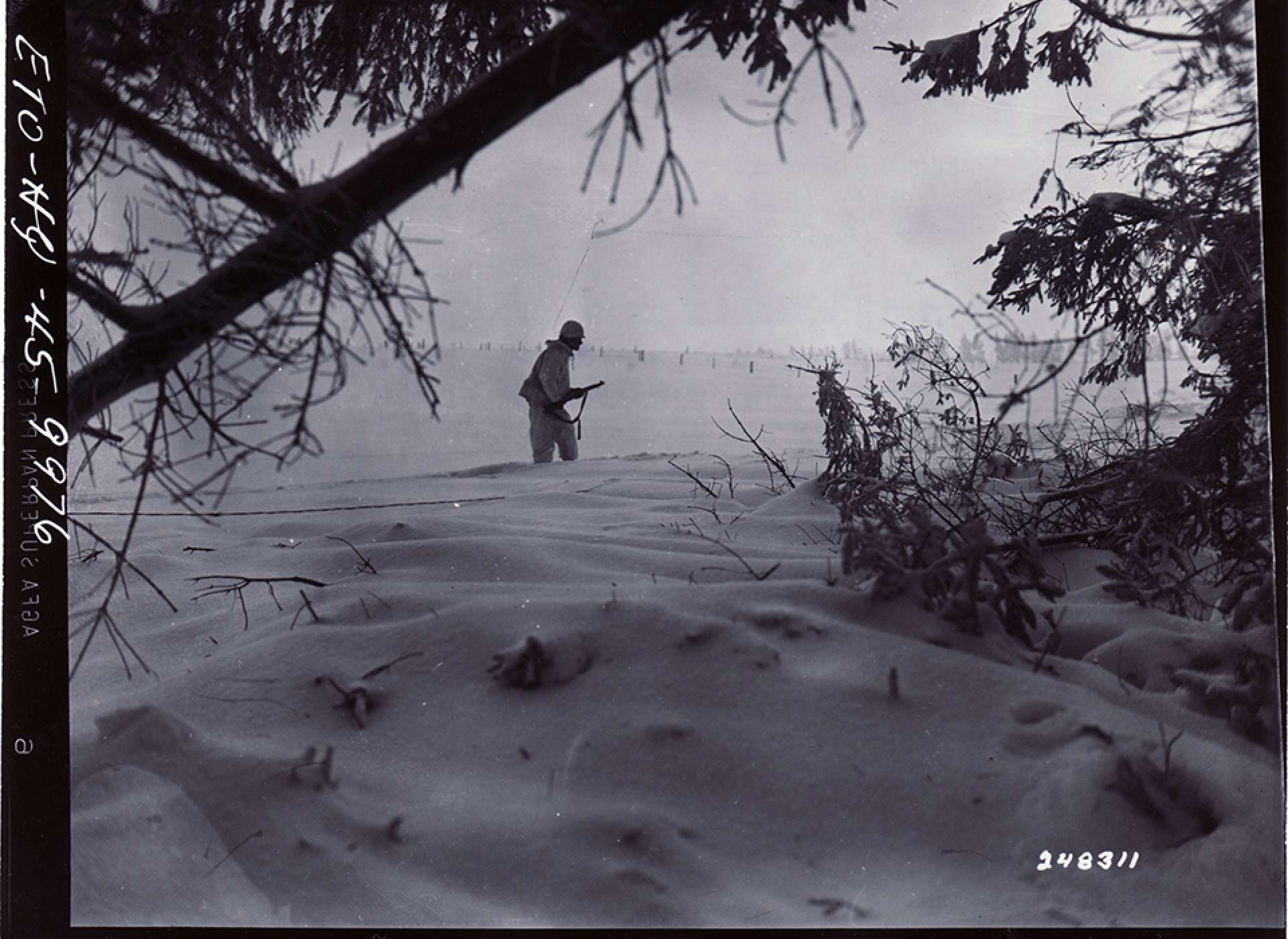 1st Infantry Division soldier on patrol near Bullingen, Belgium. The National WWII Museum Digital Collections.