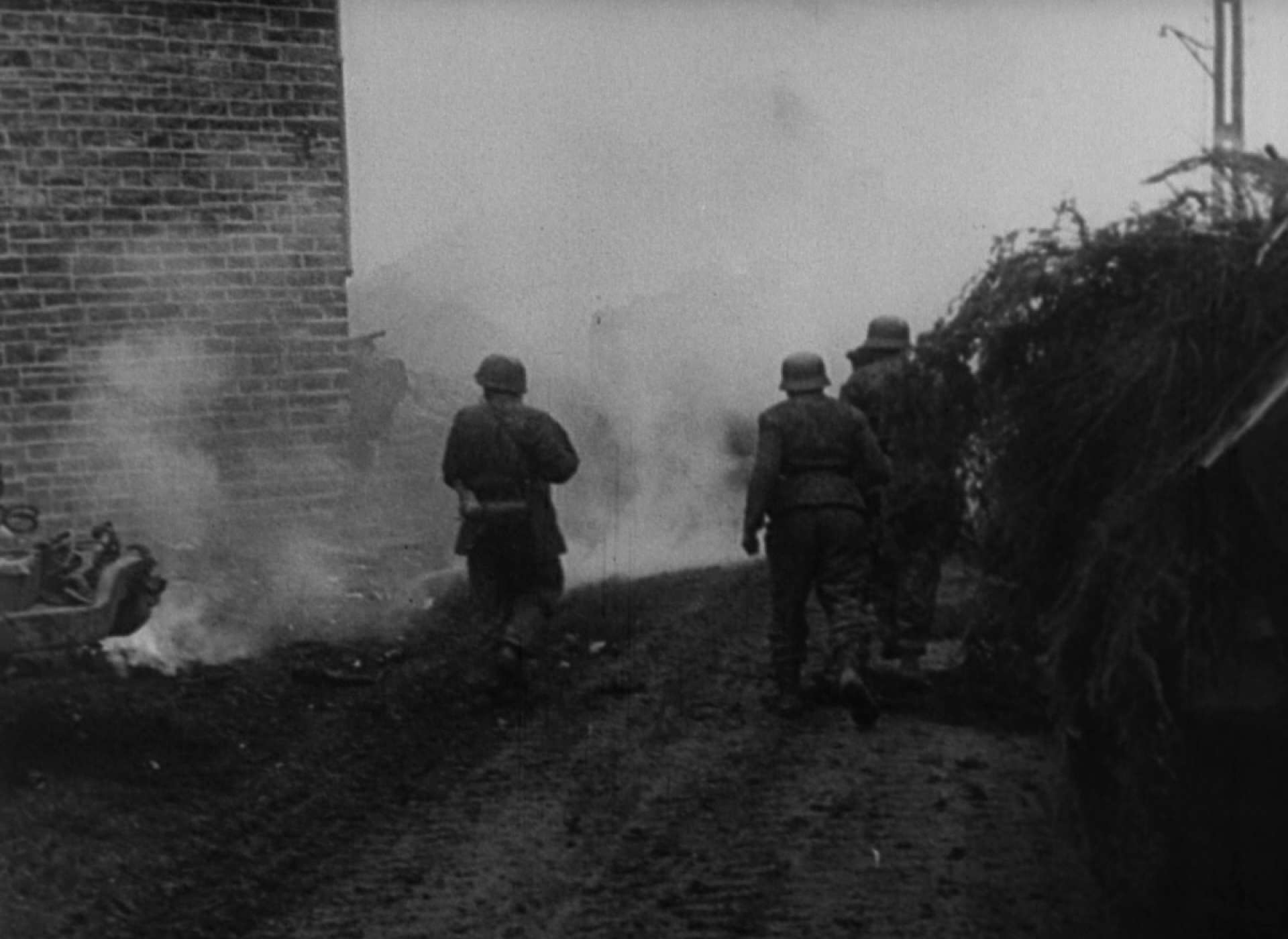 SS Panzergrenadiers and Fallschirmjager mop up in Stoumont.