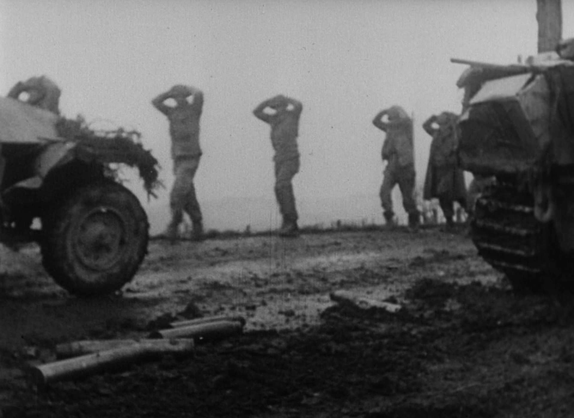 US POWs from Stoumont march past a Panther from Peipers column.