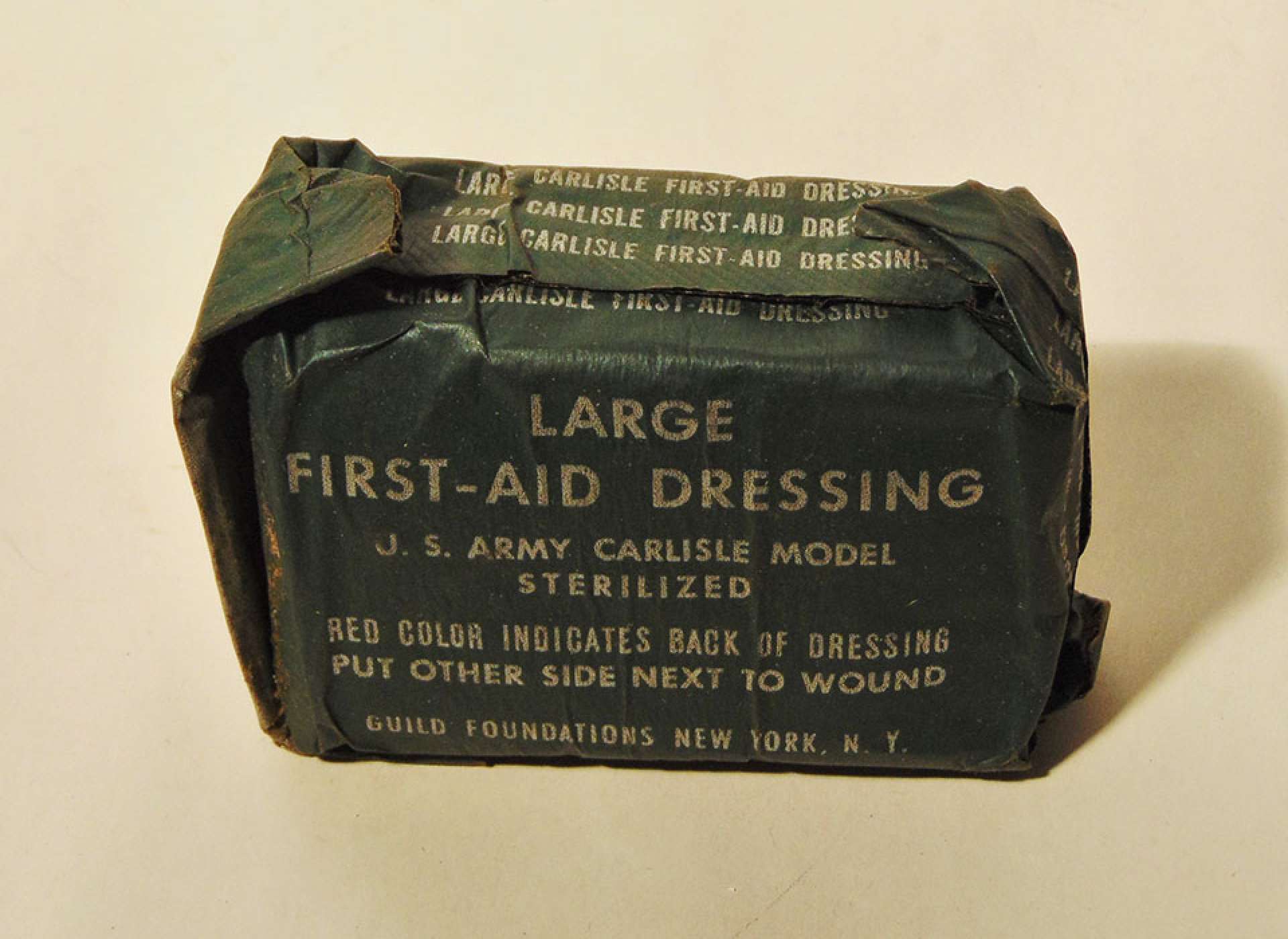 The Carlisle kit was a bandage package in a pouch carried by all soldiers on their belt.