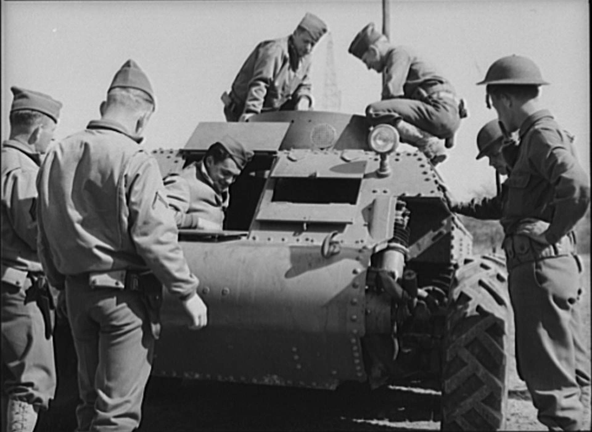 Soldiers inspecting new trackless tank during demonstration at Fort Myer, Virginia, April 1941. Library of Congress