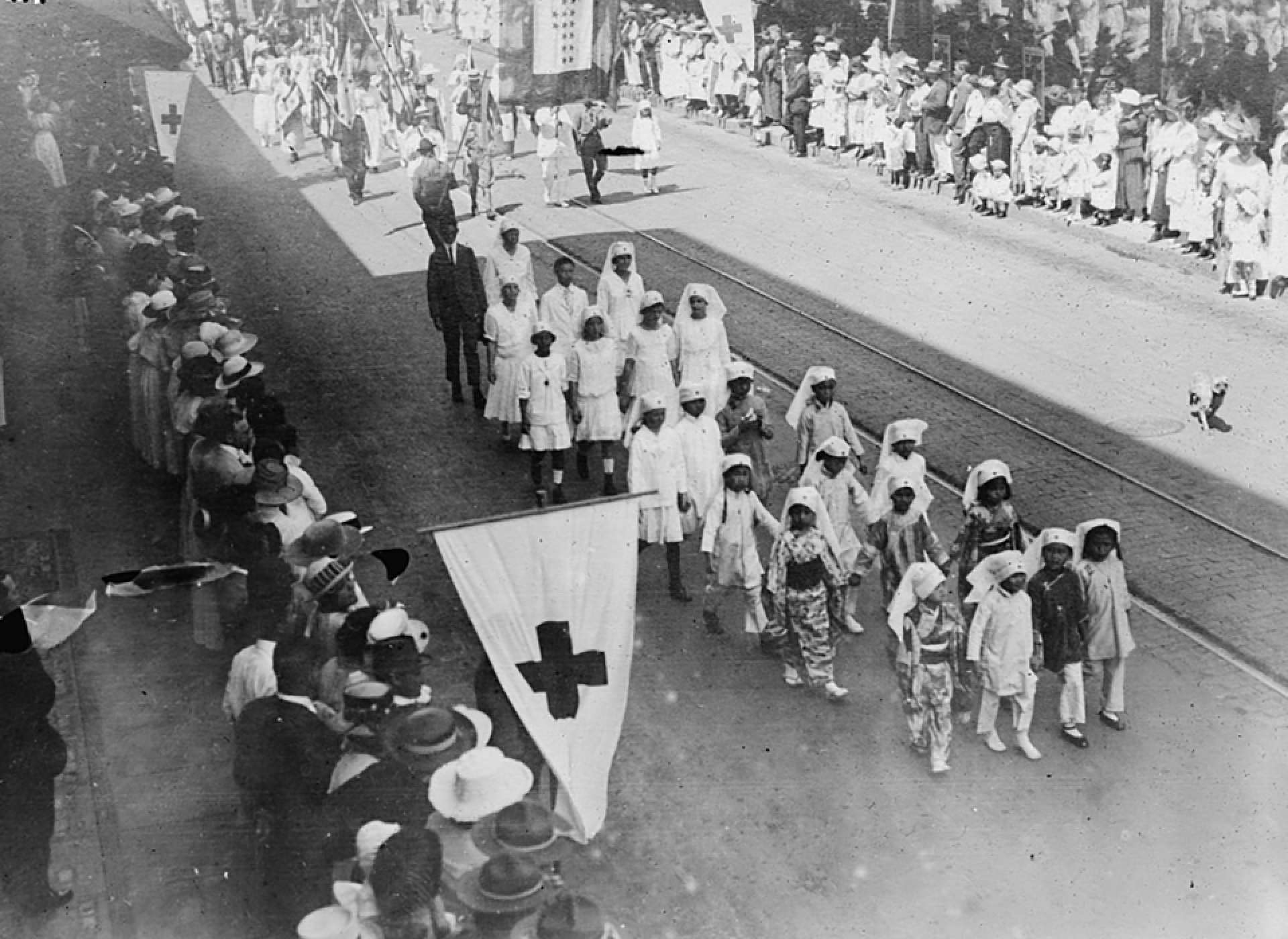 Chinese and Japanese children marching in a Junior Division American Red Cross Parade in Honolulu in 1918.