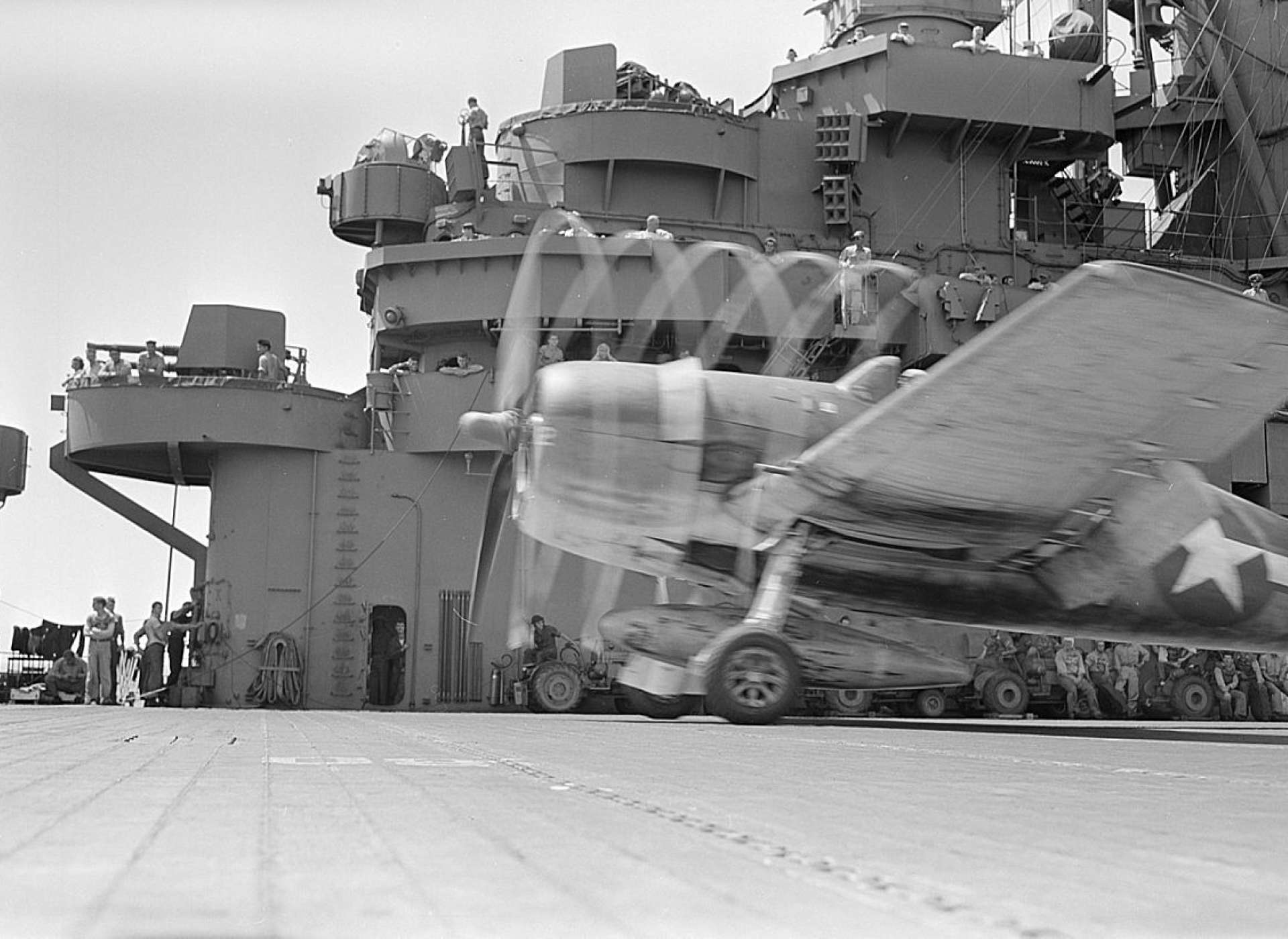 Airplane takes off from the deck of an aircraft carrier during WWII
